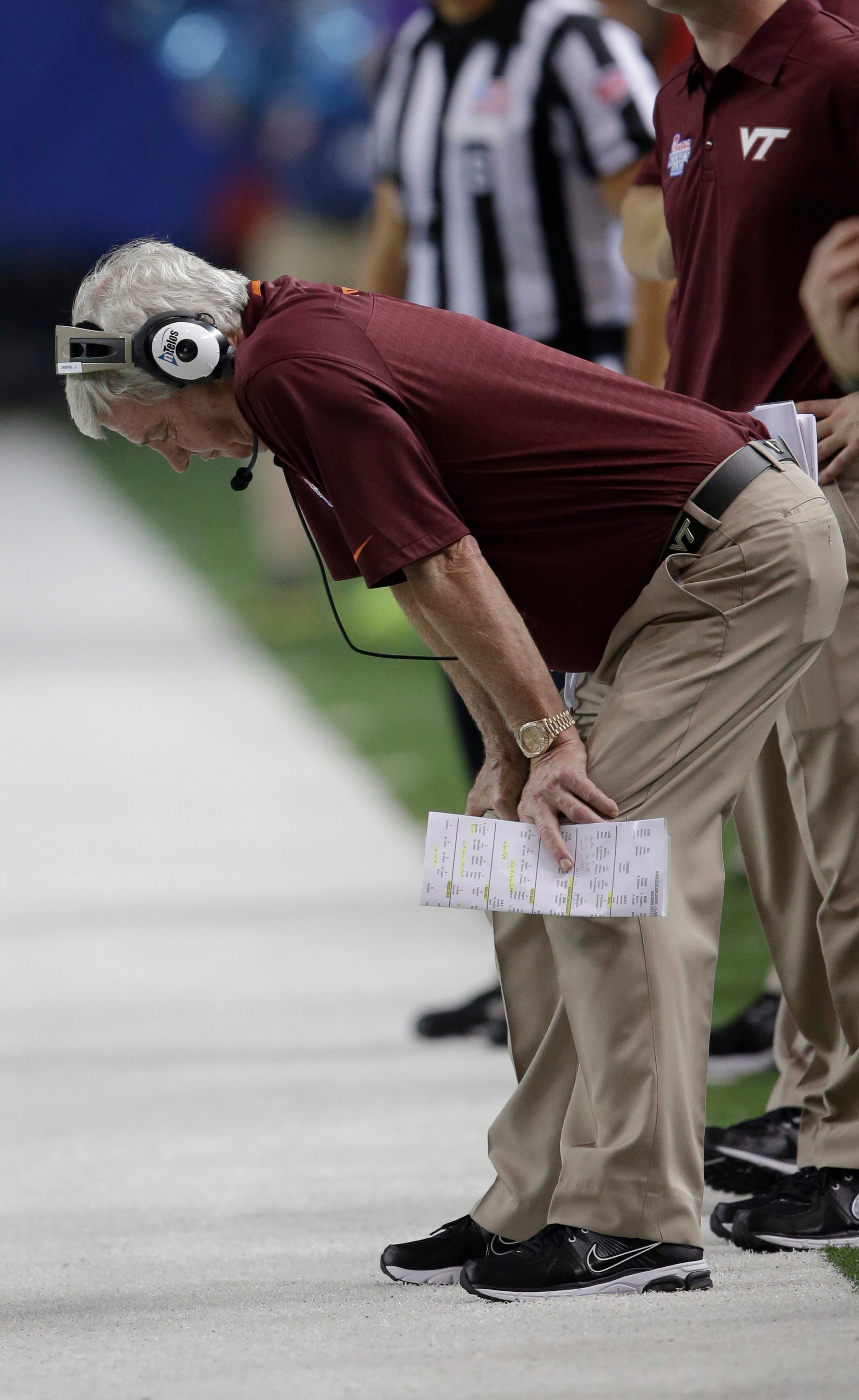 Virginia Tech head coach Frank Beamer looks on from the sidelines in the first quarter of an NCAA college football game against Alabama, Saturday, Aug. 31, 2013, in Atlanta. (AP Photo/John Bazemore)