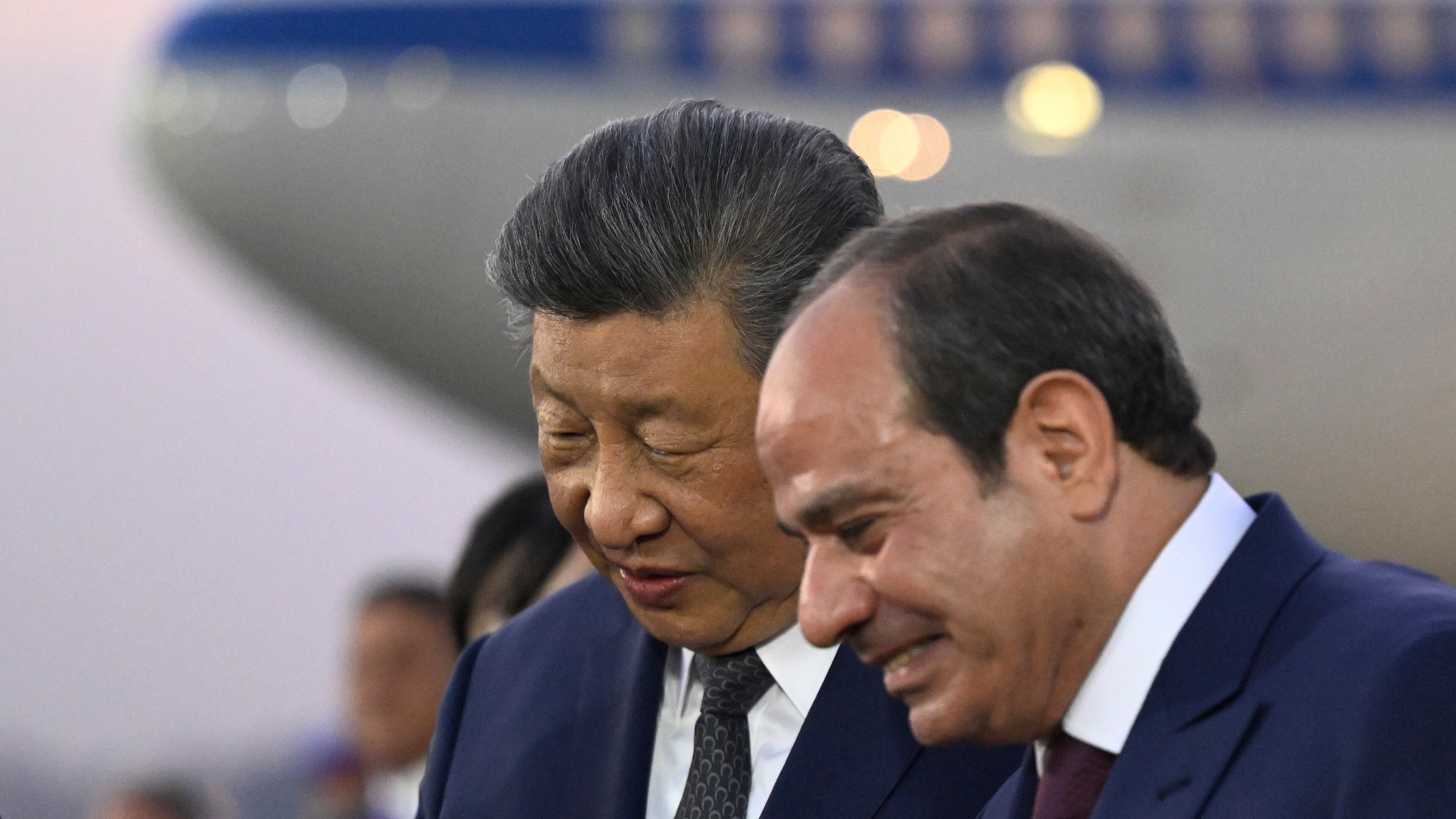 Chinese President Xi Jinping, centre, is welcomed by Egyptian President Abdel-Fattah el-Sissi at Cairo International Airport in Cairo, Egypt, Tuesday, Sept. 1, 2026. (Khaled Desouki/Pool Photo via AP)