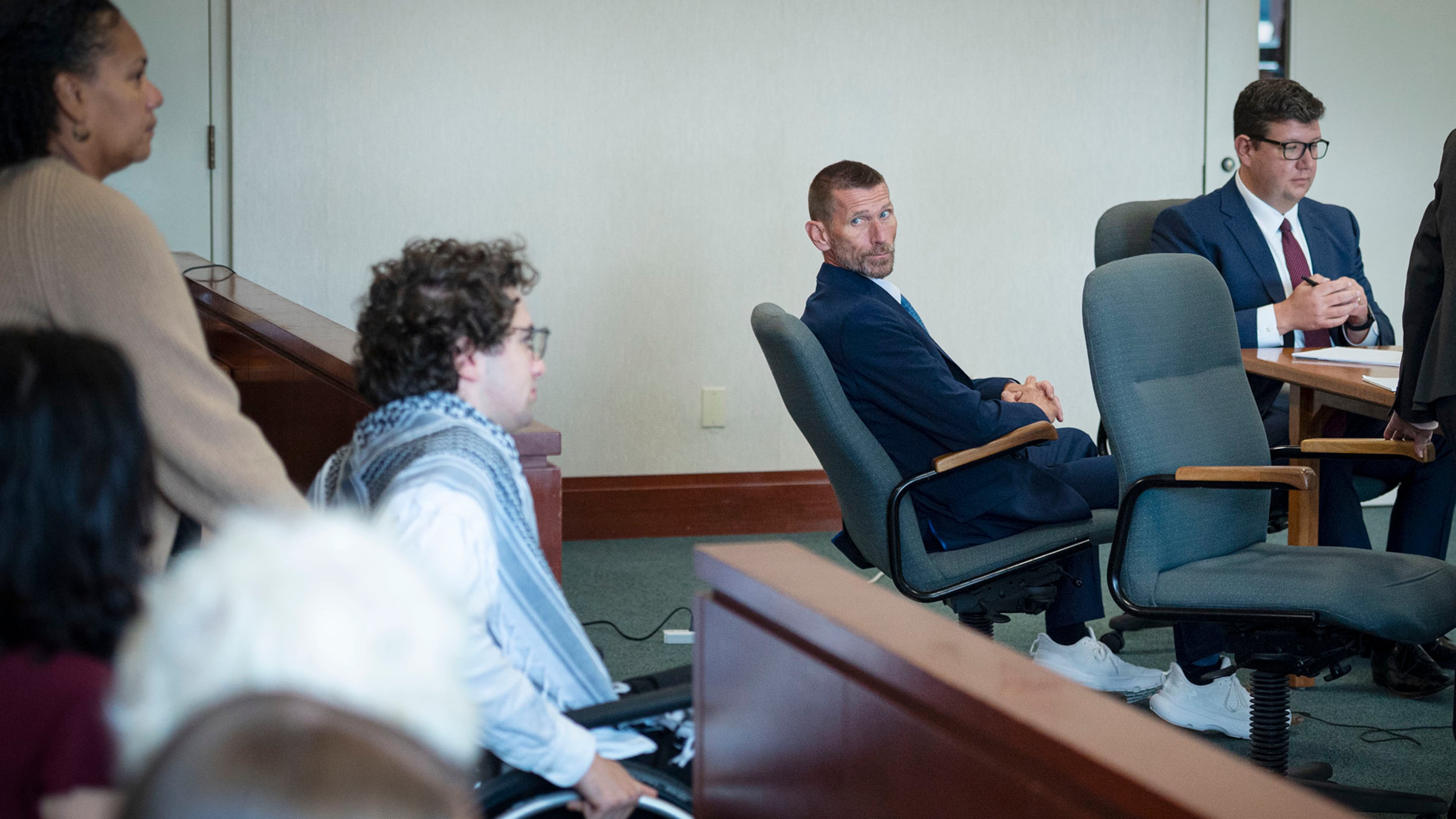 Jason Eaton watches as Hisham Awartani arrives to testify in Eaton's trial in Burlington, Vt., Monday, Sept. 14, 2026. (Glenn Russell/Pool photo via AP)