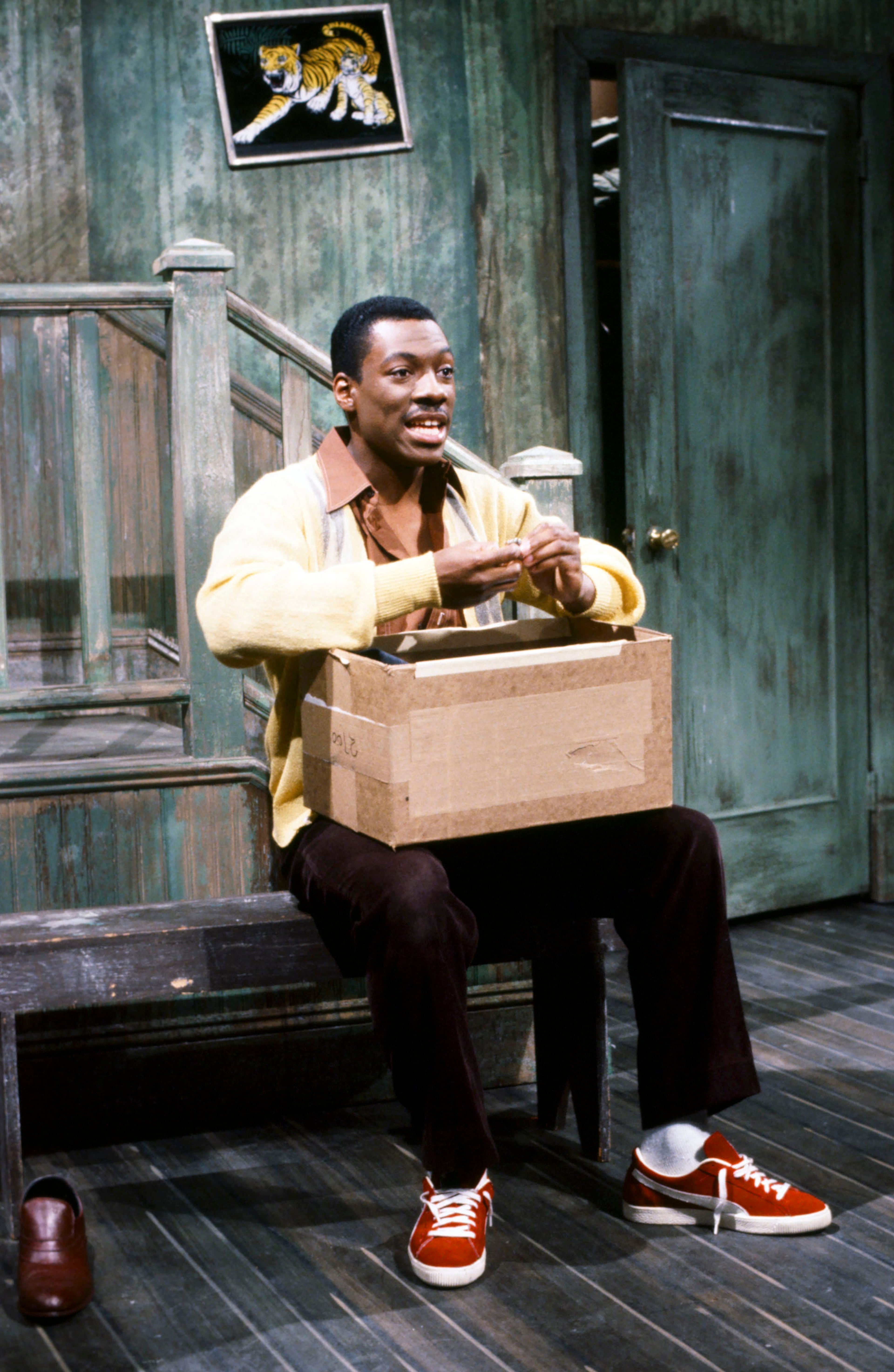 In this May 13, 1983 photo released by NBC shows Eddie Murphy as Mr. Robinson during the "Mister Robinson's Neighborhood" skit on "Saturday Night Live," in New York. The long-running sketch comedy series will celebrate their 40th anniversary with a 3-hour special airing Sunday at 8 p.m. EST on NBC. (AP Photo/NBC, Al Levine)