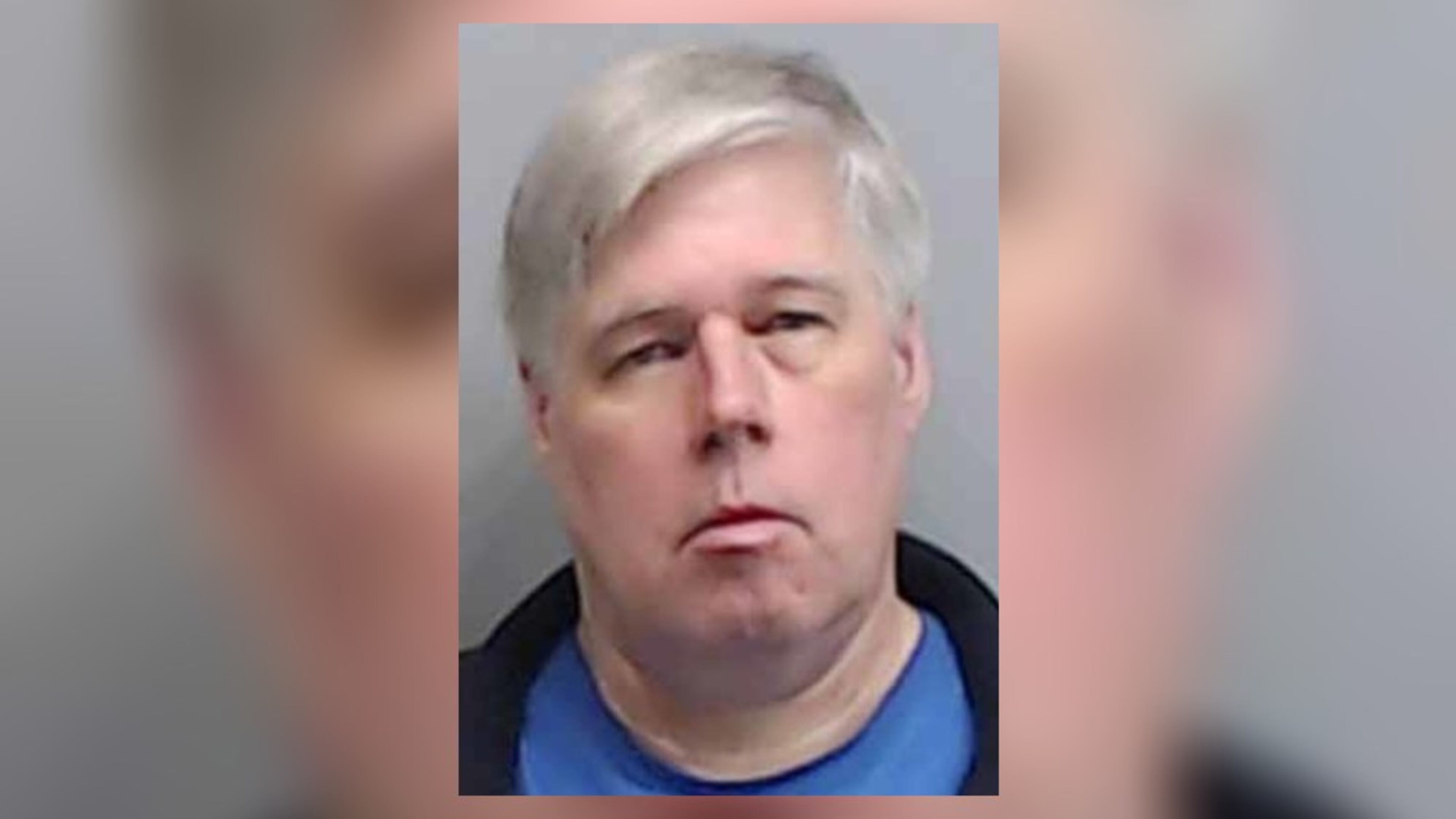 Christopher Guetter, 58, was booked into the Fulton County Jail after his arrest by Roswell police.