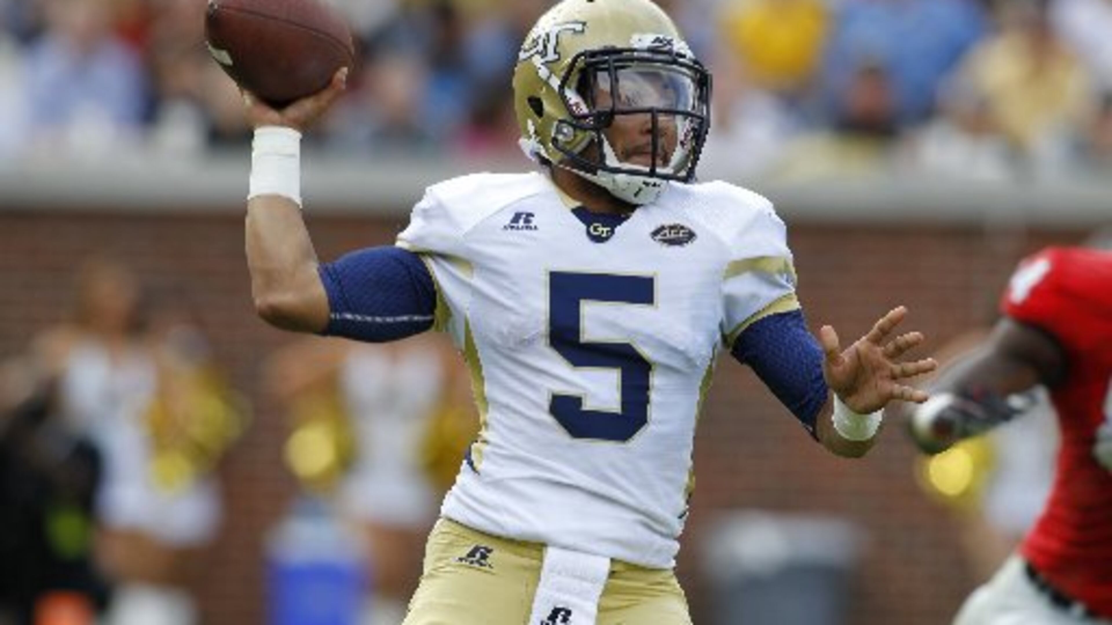 Georgia Tech quarterback Justin Thomas and his teammates may have to endure some light rain during today’s season opener in Ireland. (Credit: Brett Davis / Associated Press)