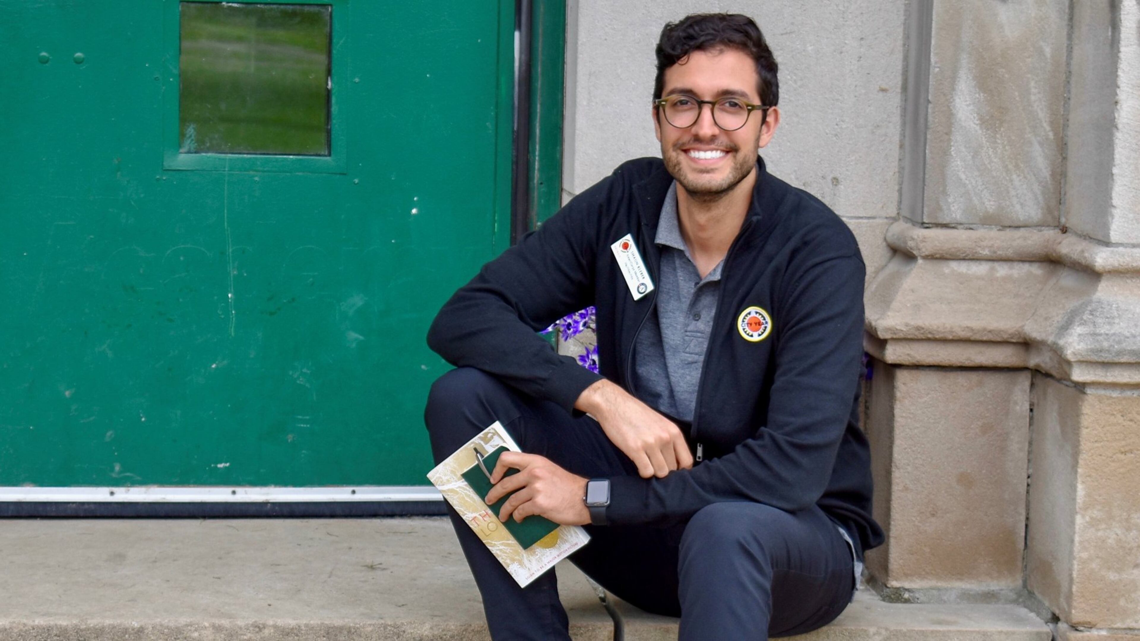 Shaun Kleber is shown outside the Detroit high school where he worked through City Year. CONTRIBUTED