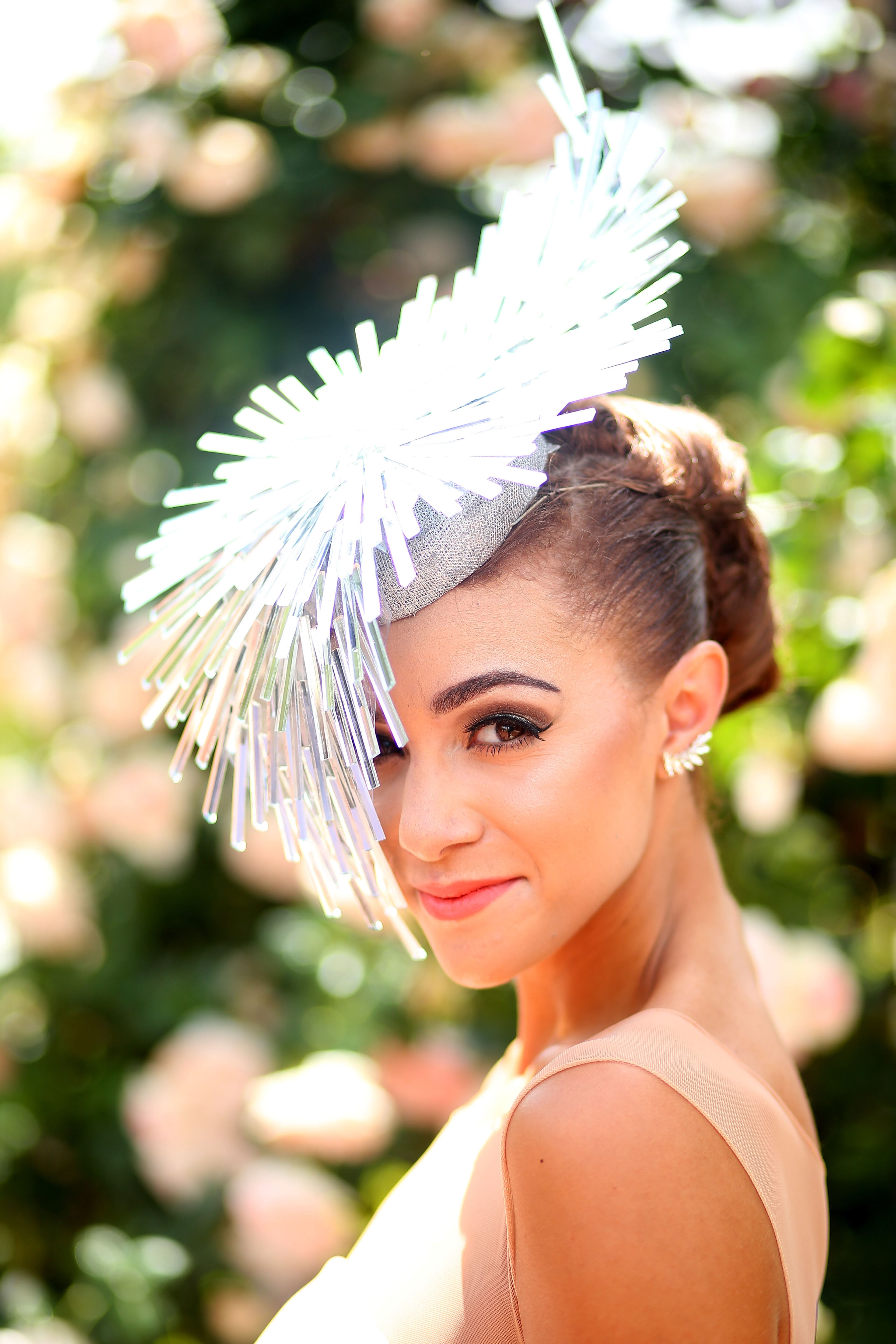 MELBOURNE, AUSTRALIA - NOVEMBER 05: A racegoer poses on Crown Oaks Day at Flemington Racecourse on November 5, 2015 in Melbourne, Australia. (Photo by Graham Denholm/Getty Images for the VRC)