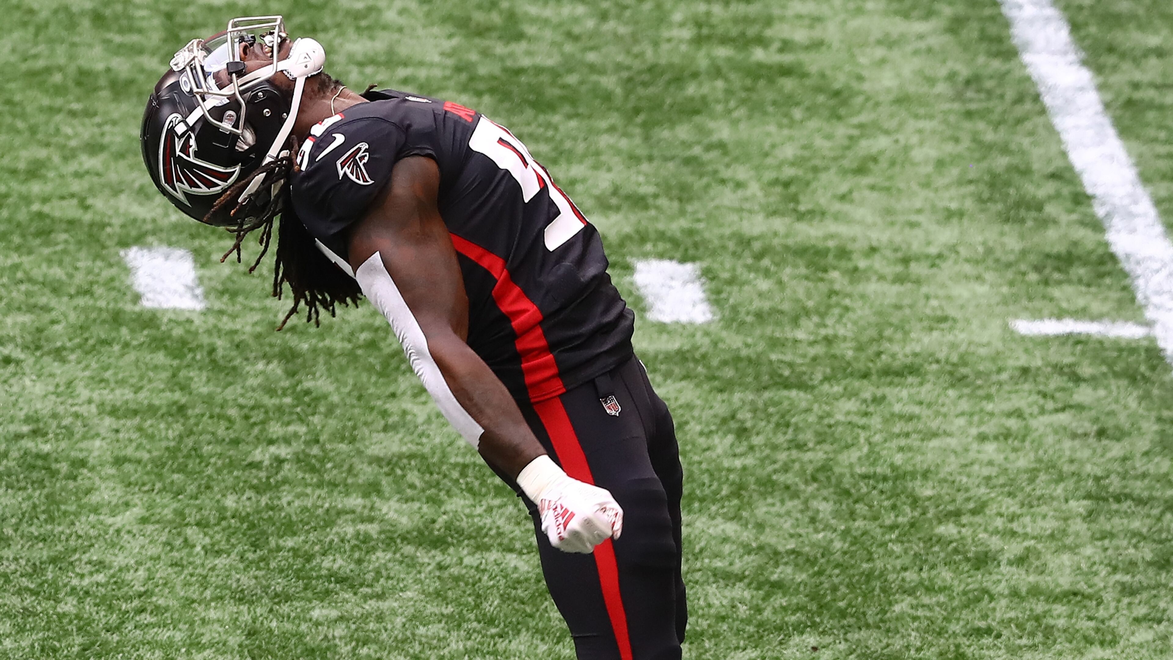 091320 Atlanta: Atlanta Falcons defensive end Takk McKinley reacts to sacking Seattle Seahawks quarterback Russell Wilson on his first offensive play of the game Sunday, Sept. 13, 2020, in Atlanta. (Curtis Compton / Curtis.Compton@ajc.com)