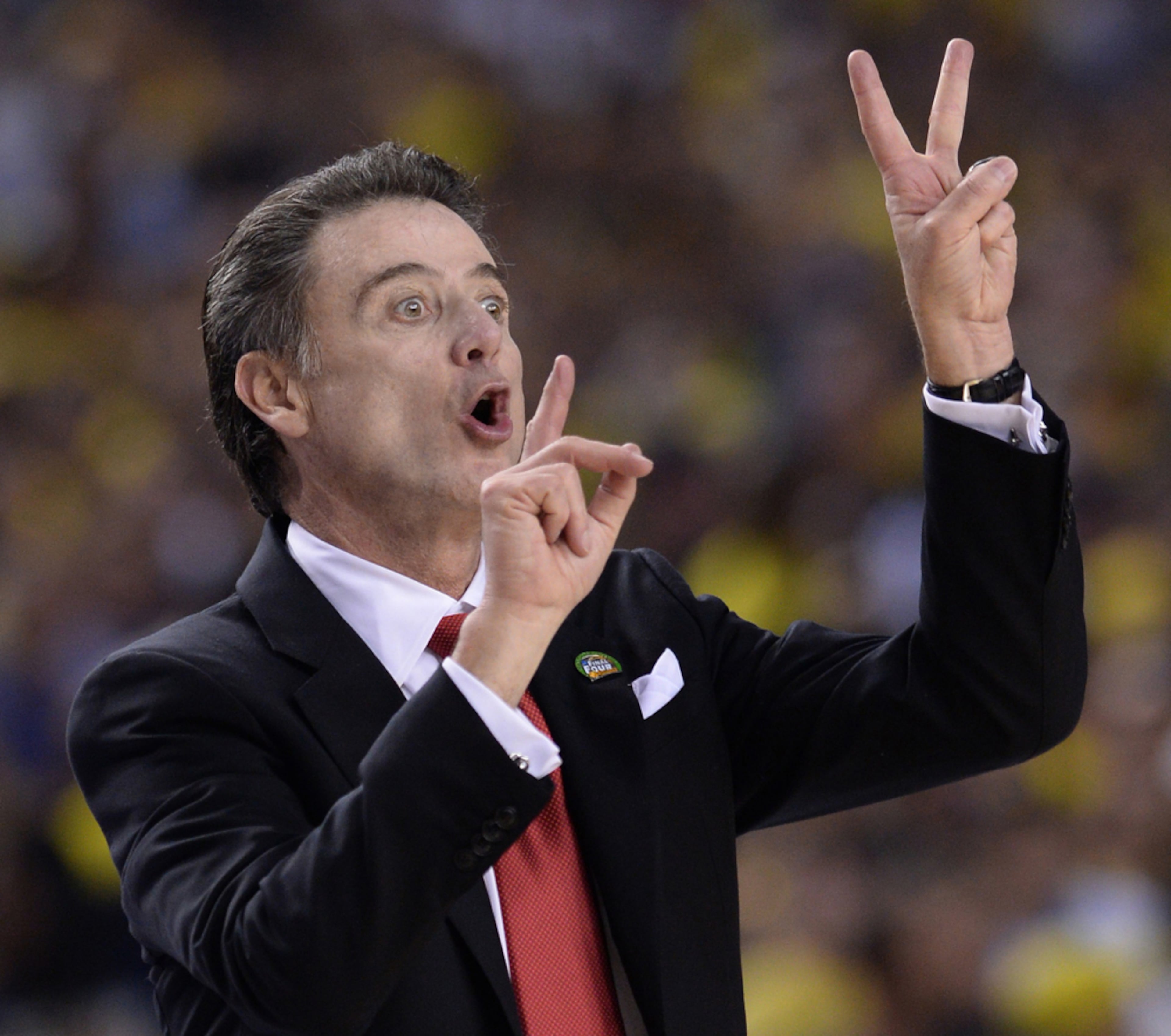 April 8, 2013 - Atlanta: Louisville coach Rick Pitino calls a play during 2013 NCAA Division 1 Men's National Championship game inside the Georgia Dome in Atlanta on Monday, April 8, 2013. Camera Nikon D4, Lens 300mm f2.8, ISO 2000, Aperture f4.5, Shutter speed 1/1000. JOHNNY CRAWFORD / JCRAWFORD@AJC.COM