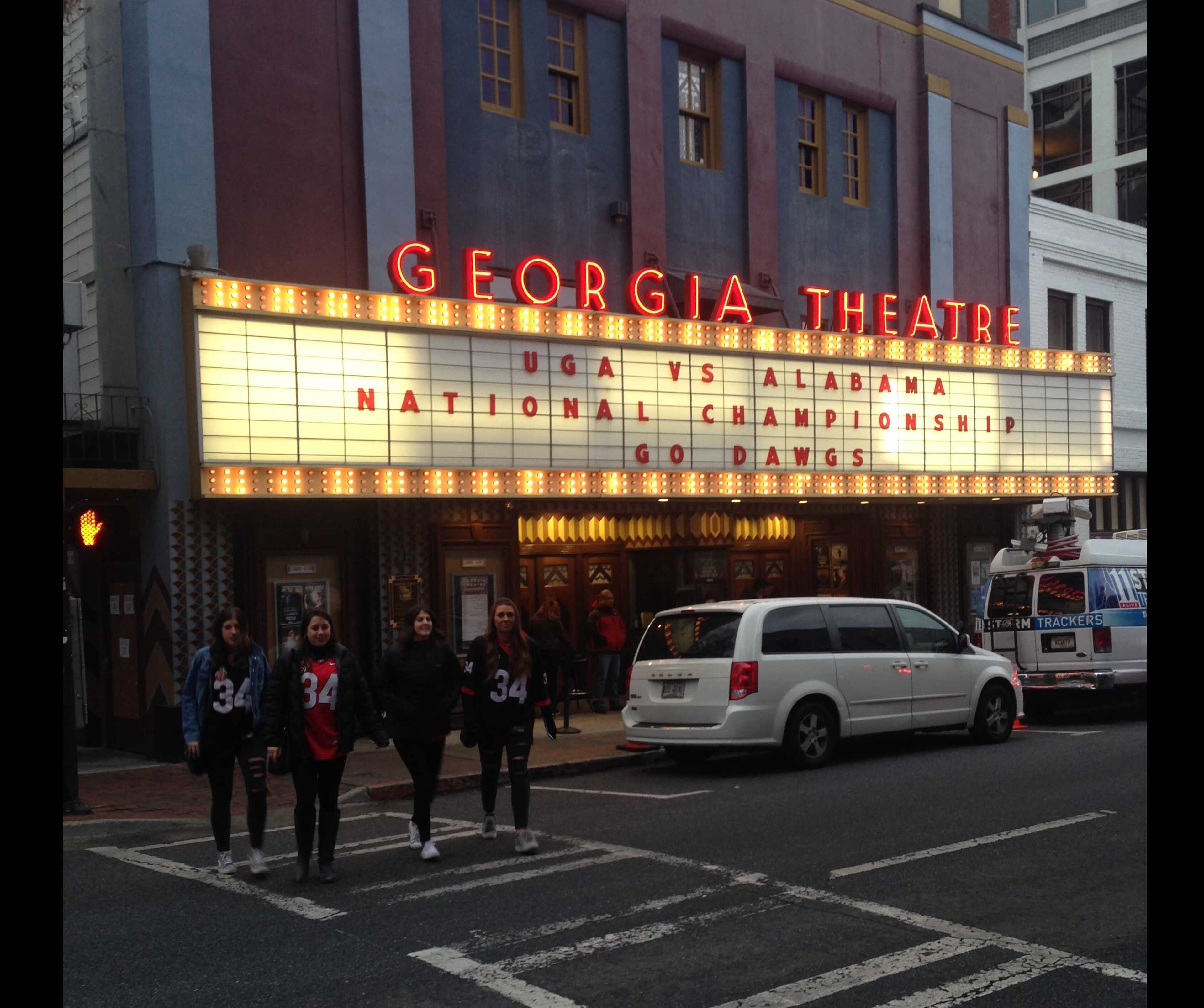 Students cross in front of the Georgia Theatre on their way to one of the local hangouts. Photo Credit: Victoria R. Knight