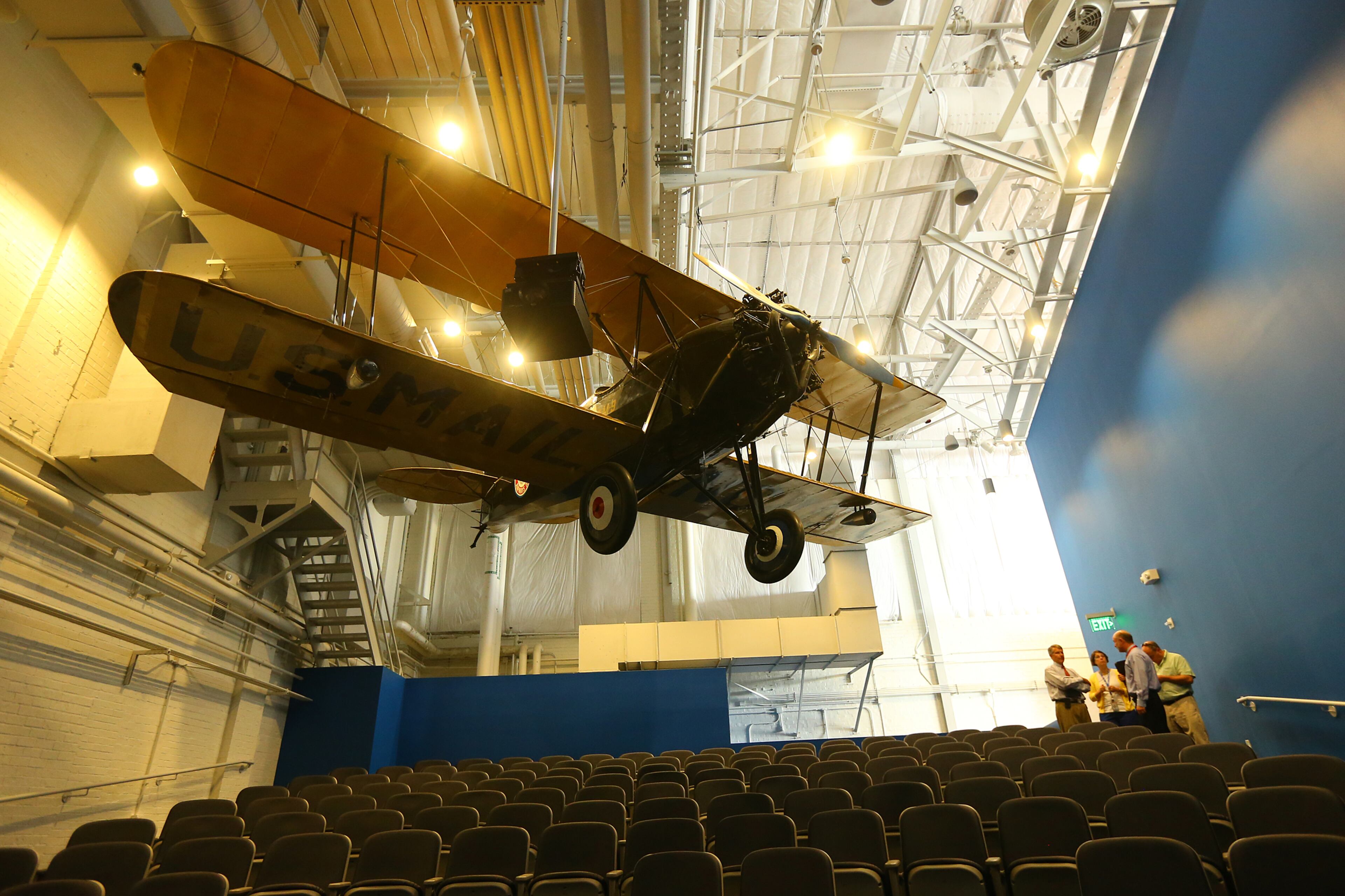 061214 ATLANTA: A Northwest Airways Waco 125 hangs over an auditorium in the Delta Flight Museum on Thursday, June 12, 2014, in Atlanta. This rare version of the popular Waco 10 biplane has a Siemens-Halske SH-12 engine. Only about 21 of the planes were built and this is the only one remaining. CURTIS COMPTON / CCOMPTON@AJC.COM