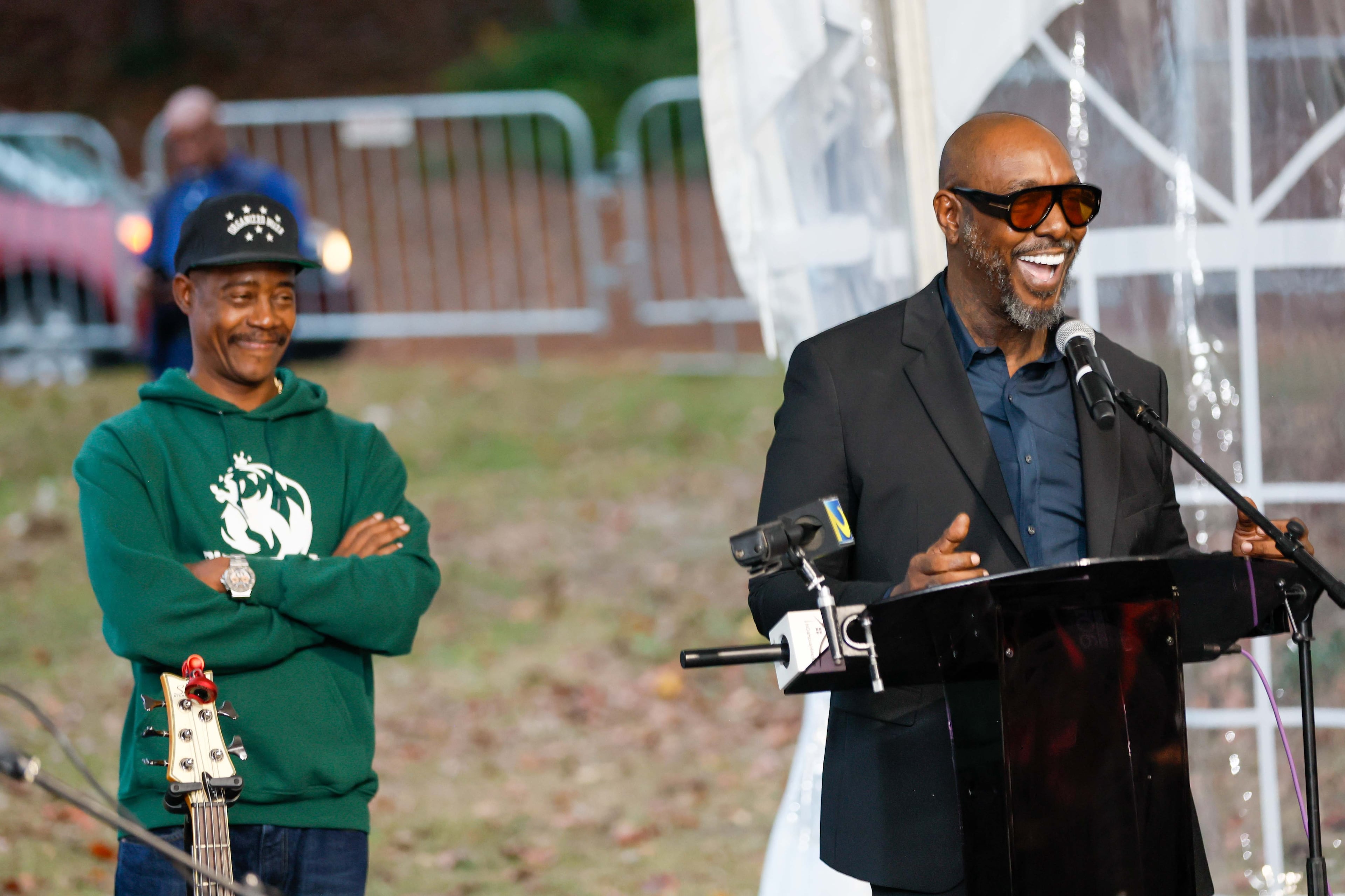 Organized Noize member Sleppy Brown smiles as Ray Murray looks as he speaks during the celebrations of the life and legacy of Rico Wade in Esat Point on Thursday, Nov. 7, 2024.
(Miguel Martinez / AJC)