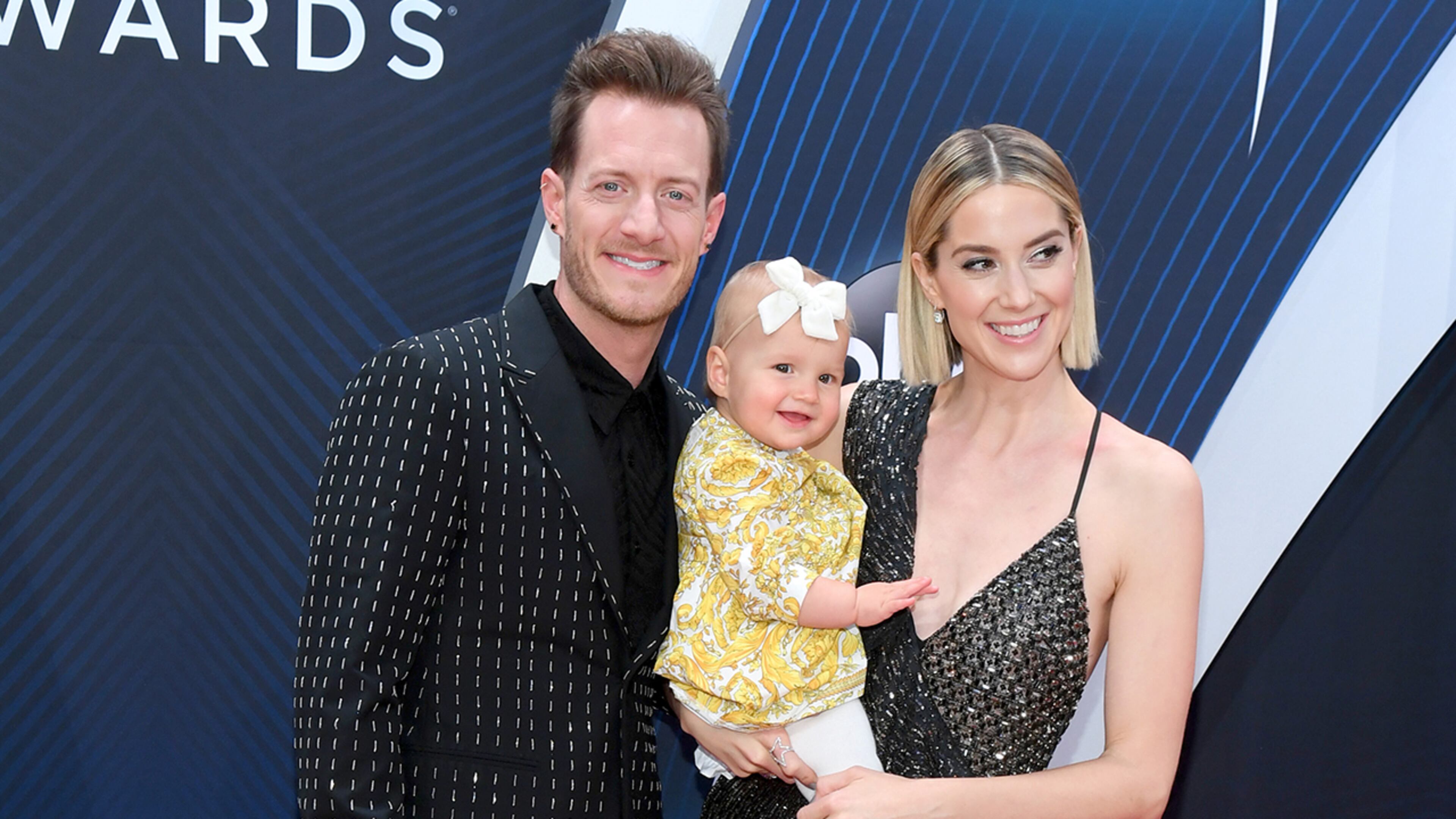 NASHVILLE, TN - NOVEMBER 14: (FOR EDITORIAL USE ONLY) Tyler Hubbard of musical duo Florida Georgia Line, daughter and Hayley Hubbard attend the 52nd annual CMA Awards at the Bridgestone Arena on November 14, 2018 in Nashville, Tennessee. (Photo by Jason Kempin/Getty Images)