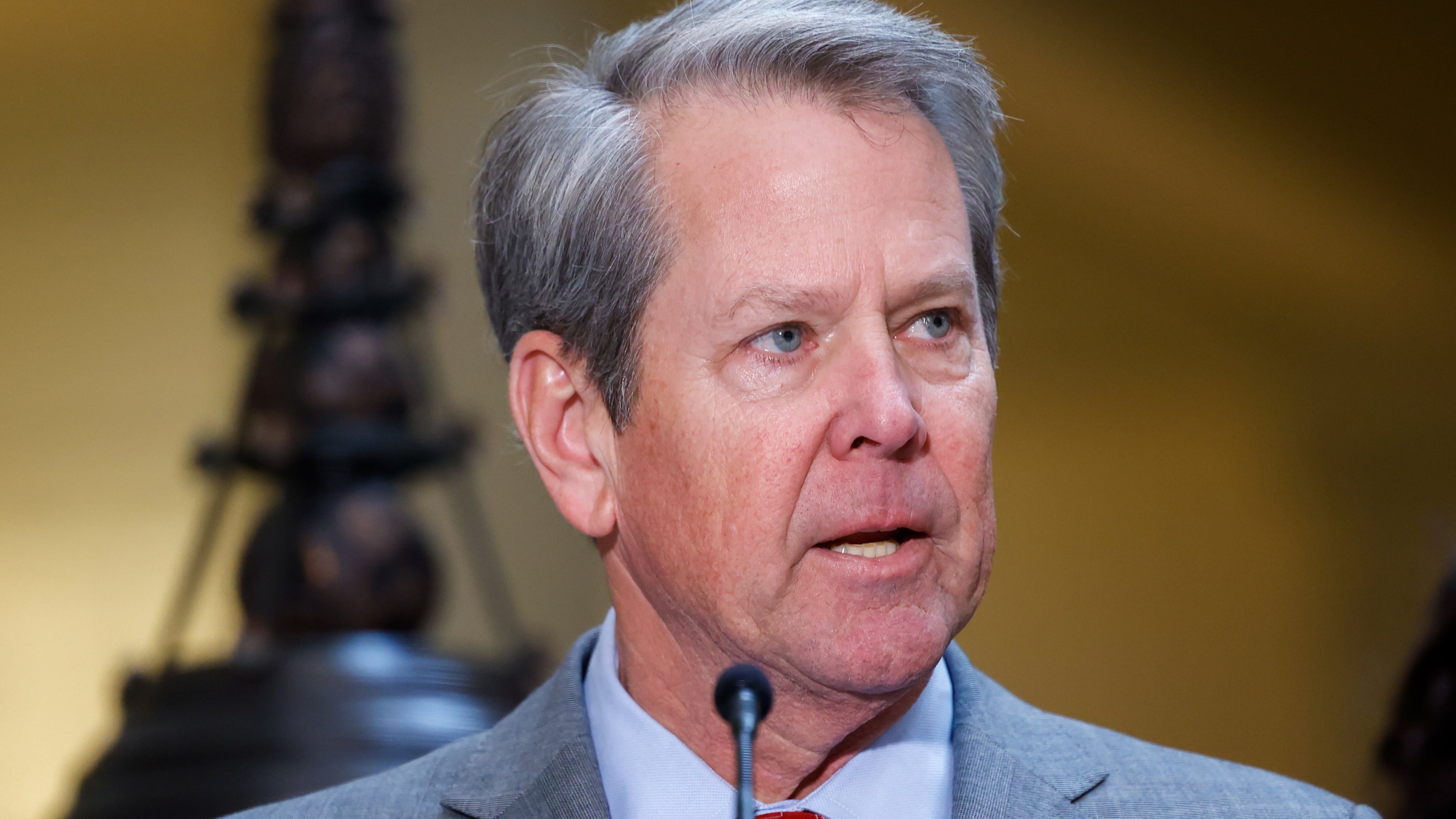 Gov. Brian Kemp at a news conference in March. (Arvin Temkar/AJC)