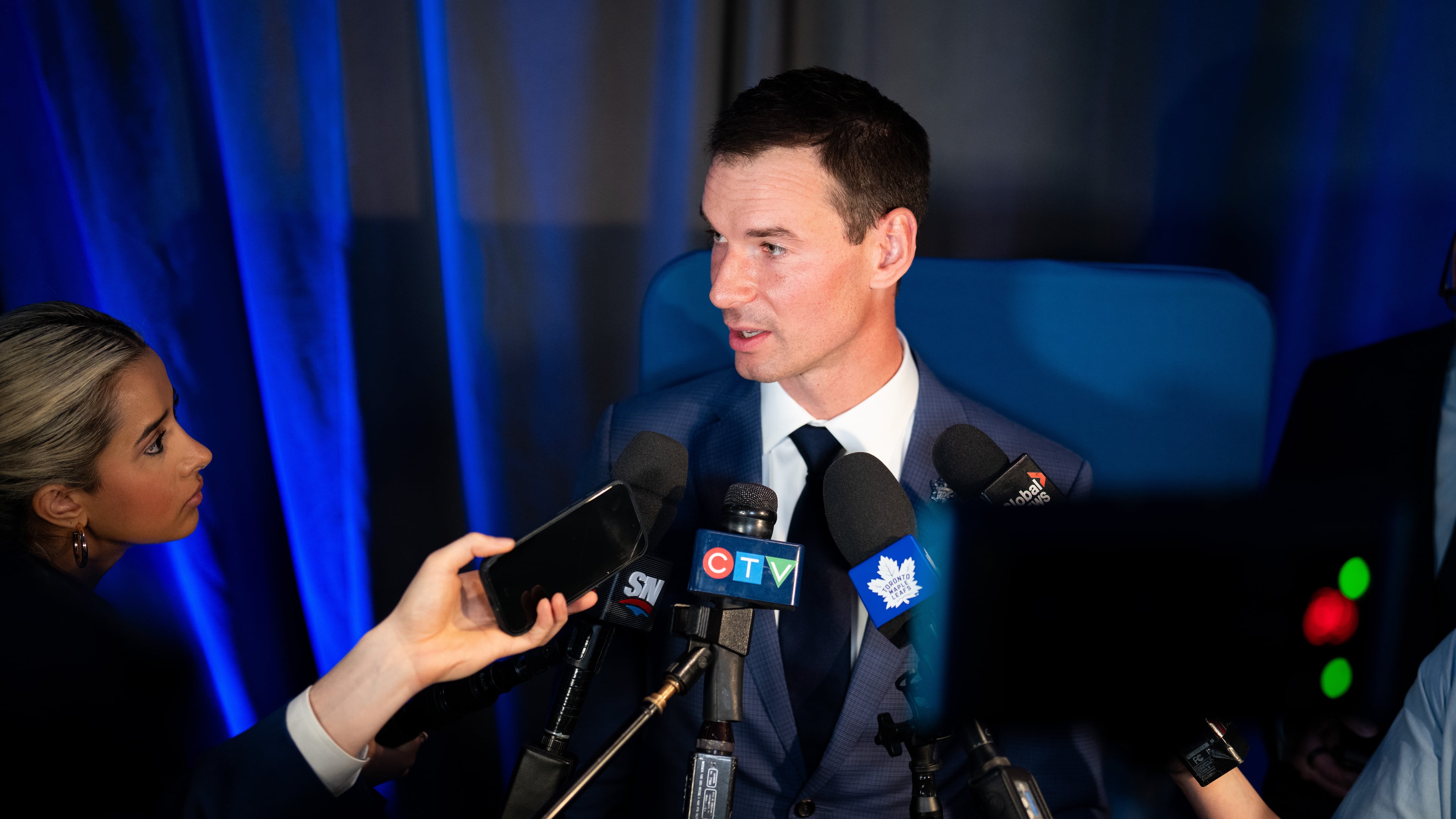 FILE - New Toronto Maple Leafs General Manager John Chayka speaks during a scrum following a news conference in Toronto, May 4, 2026. (Arlyn McAdorey/The Canadian Press via AP, File)