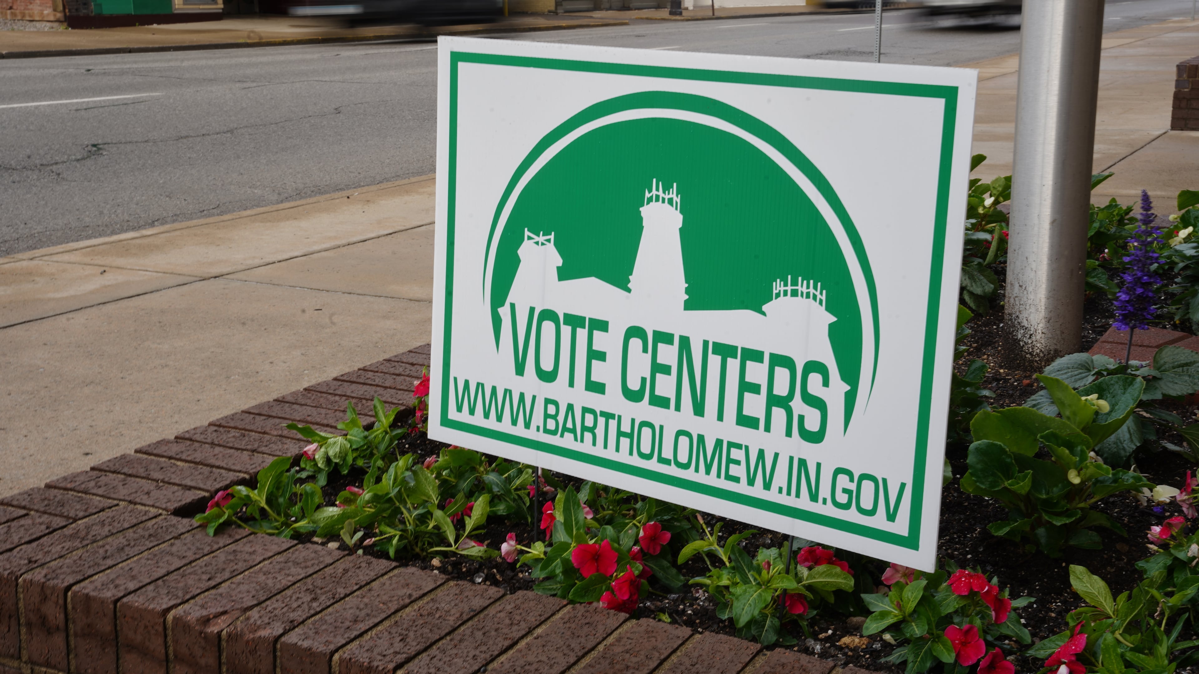 A voting sign is seen outside the Bartholomew County Governmental Office Building in Columbus, Ind., on Thursday, May 5, 2026. (AP Photo/Obed Lamy)