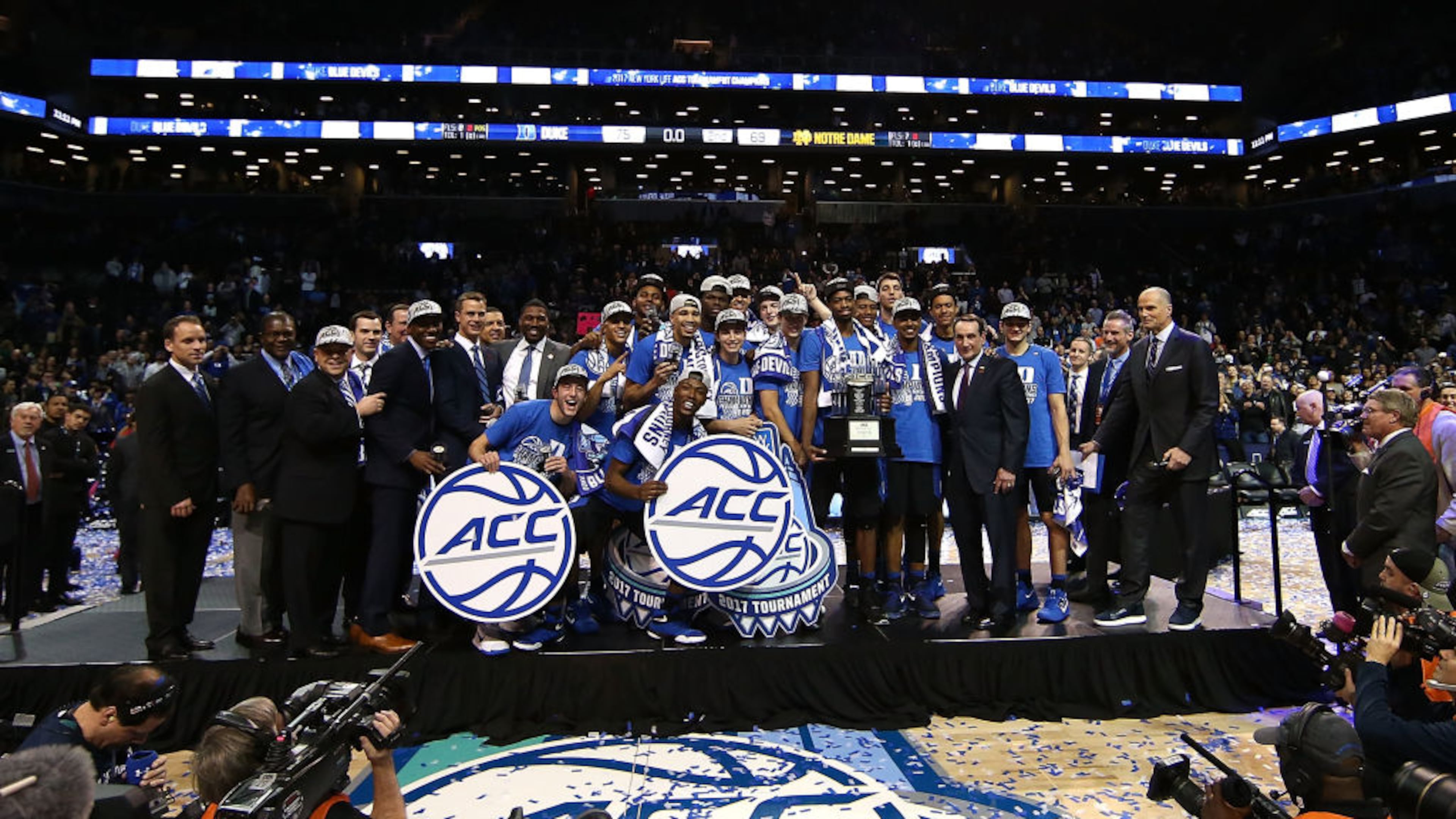 The Duke Blue Devils hold up the trophy after defeating the Notre Dame Fighting Irish 75-69 in the championship game of the 2017 Men’s ACC Basketball Tournament at the Barclays Center on March 11, 2017 in New York City. (Photo by Al Bello/Getty Images)