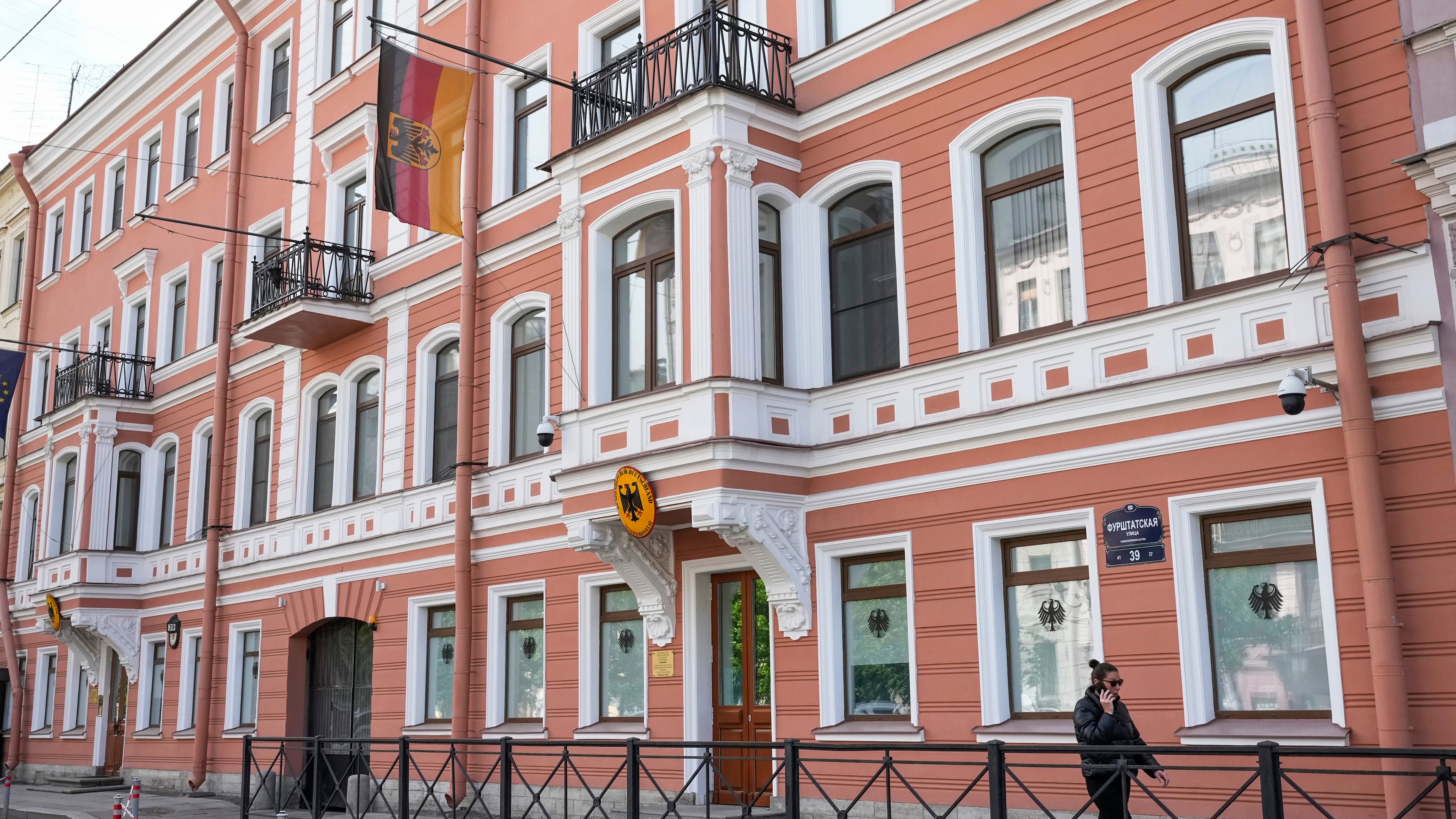 FILE - A woman walks past the German Consulate General building in St. Petersburg, Russia, June 1, 2023. (AP Photo/Dmitri Lovetsky, File)
