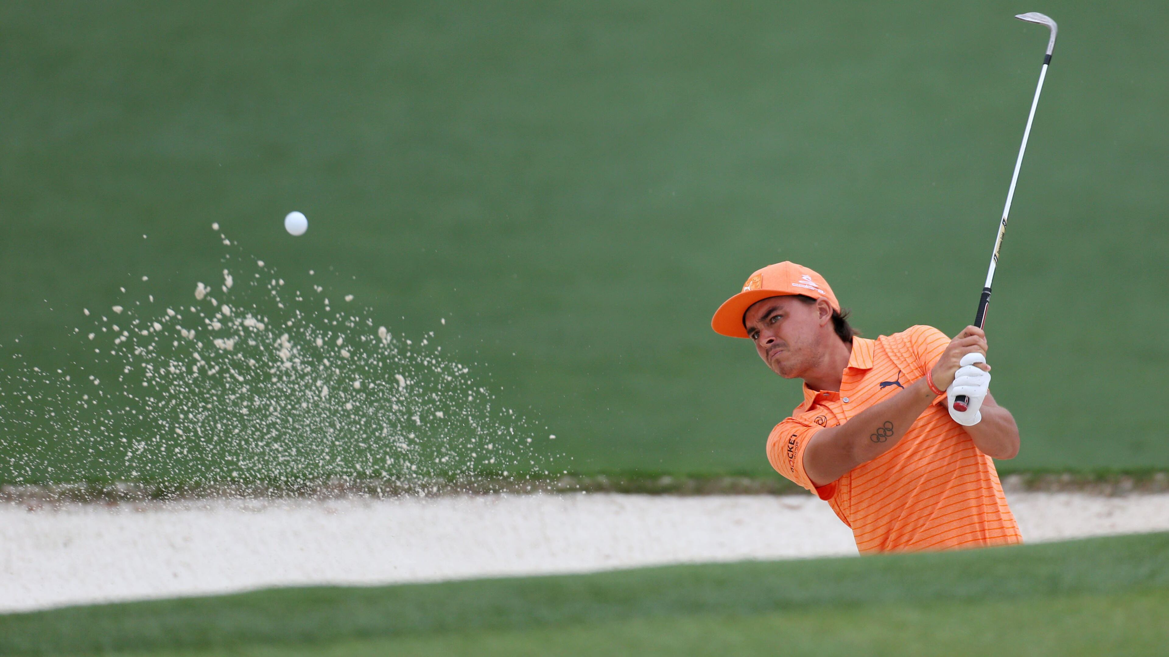 Rickie Fowler hits out of the bunker on 2 during the final round of the Masters Sunday, April 14, 2019, at Augusta National Golf Club in Augusta.