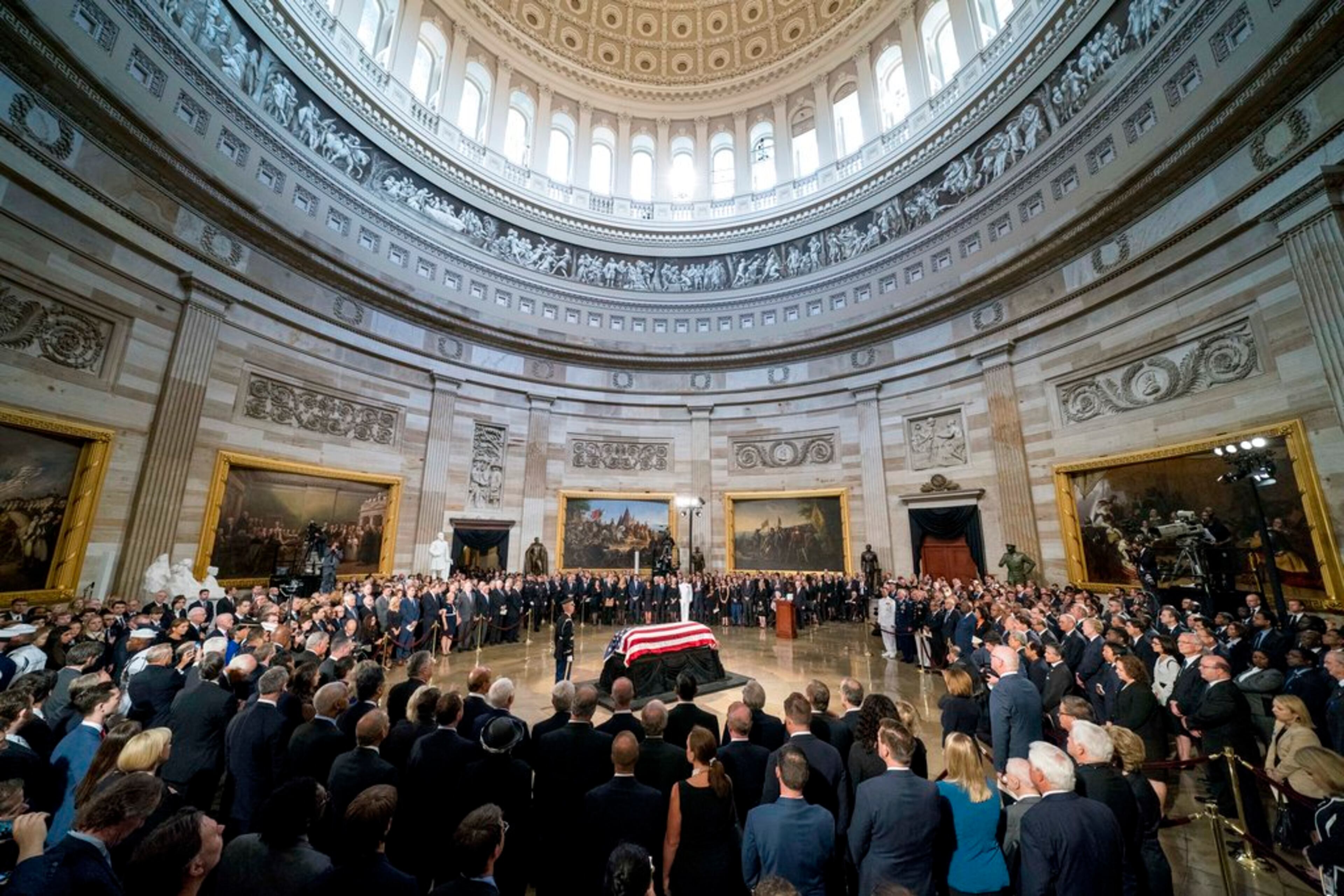 The casket of Sen. John McCain, R-Ariz., lies in state at the U.S. Capitol, Friday, Aug. 31, 2018, in Washington. (AP Photo/Andrew Harnik, Pool)