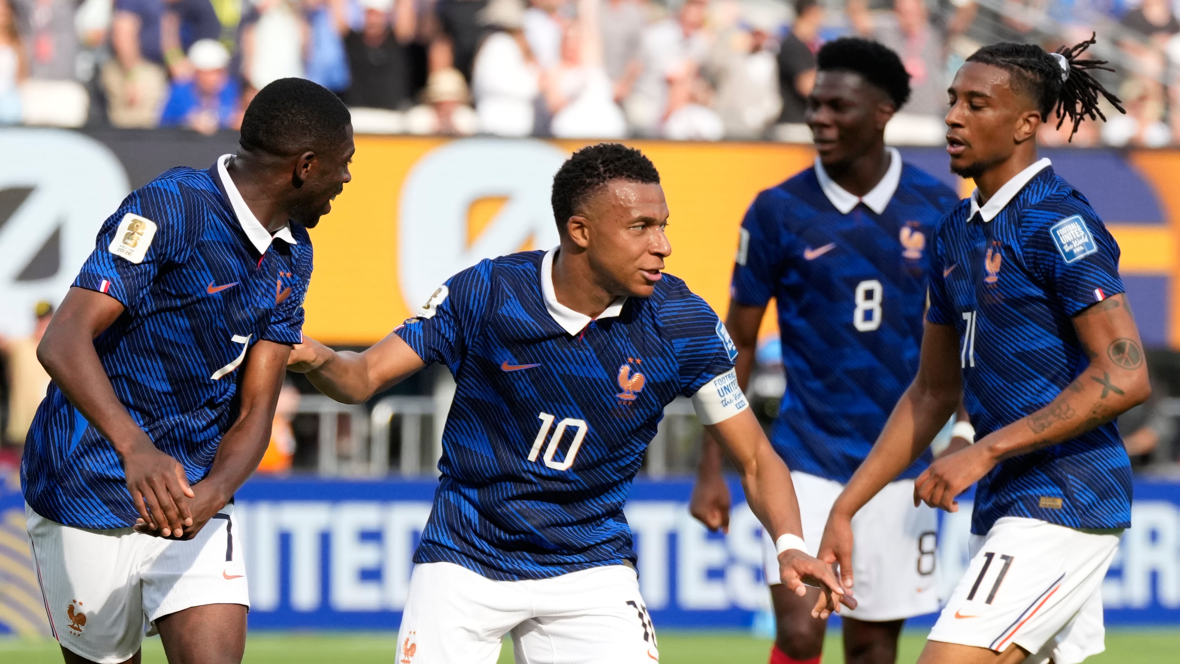 France's Kylian Mbappe, second right, celebrates with his teammates after scoring his side's opening goal during the World Cup round of 32 soccer match between France and Sweden in East Rutherford, N.J., near New York, Tuesday, June 30, 2026. (AP Photo/Seth Wenig)