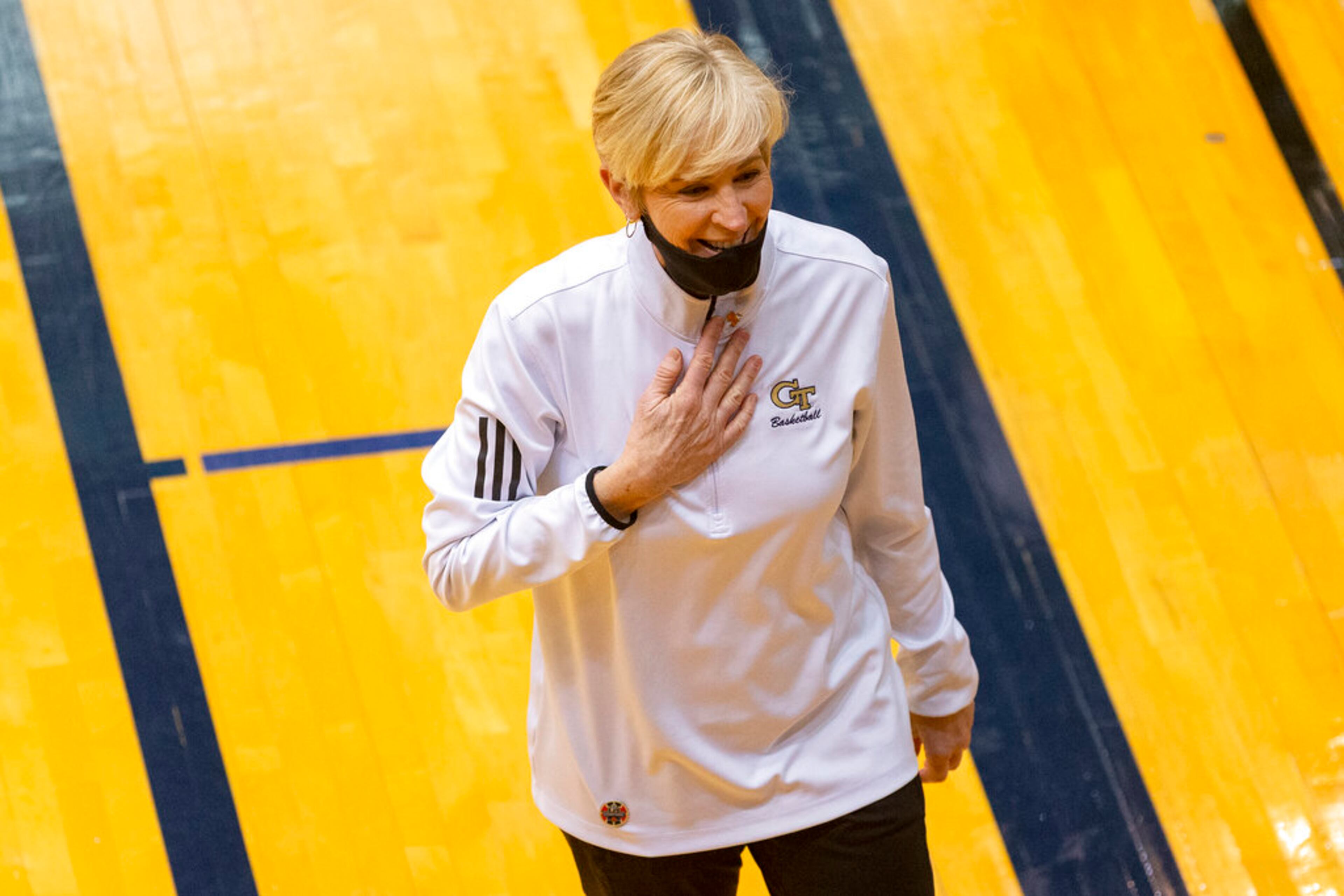 Georgia Tech coach Nell Fortner smiles after the team's 73-56 win over West Virginia in a college basketball game in the second round of the NCAA women's tournament, at the UTSA Convocation Center in San Antonio on Tuesday, March 23, 2021. (AP Photo/Stephen Spillman)