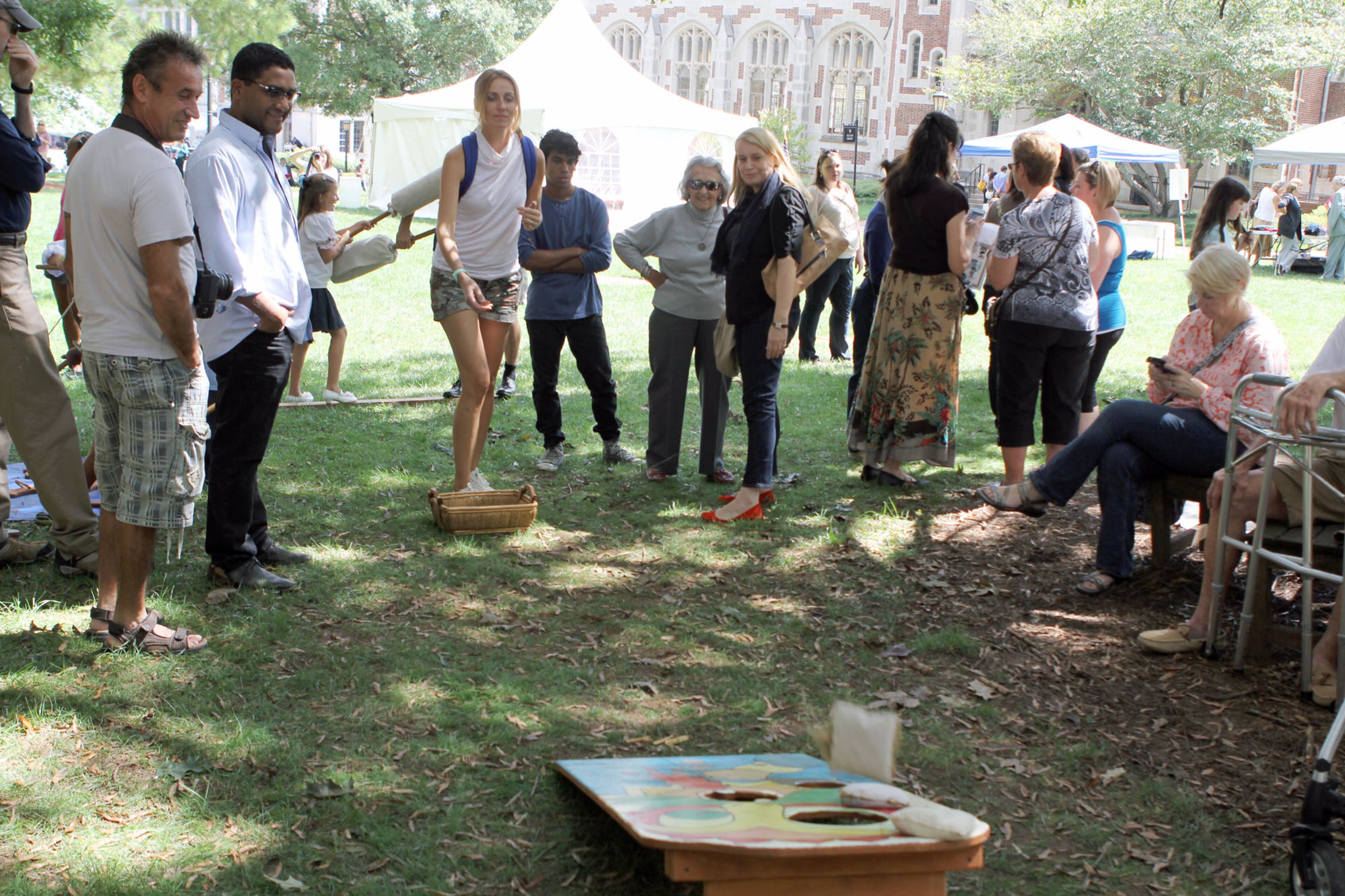 Bernadette Glaza, a first generation Hungarian-American, plays a bean-bag toss at the Atlanta Hungarian Festival on the campus of Agnes Scott College onSunday, Sept. 22, 2013.