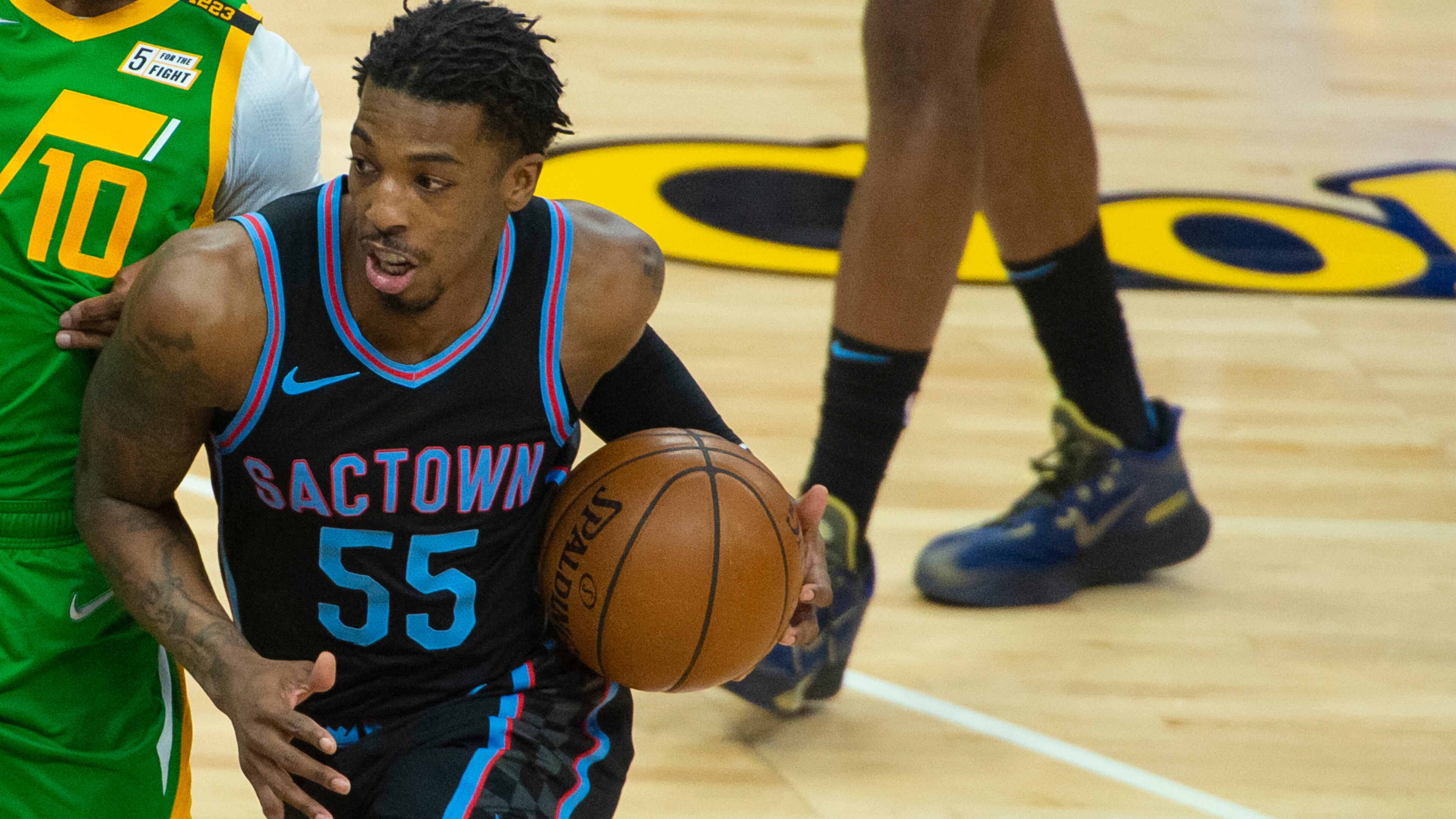 Sacramento Kings guard Delon Wright (55) drives against the Utah Jazz Sunday, May 16, 2021, in Sacramento, Calif. (Randall Benton/AP)