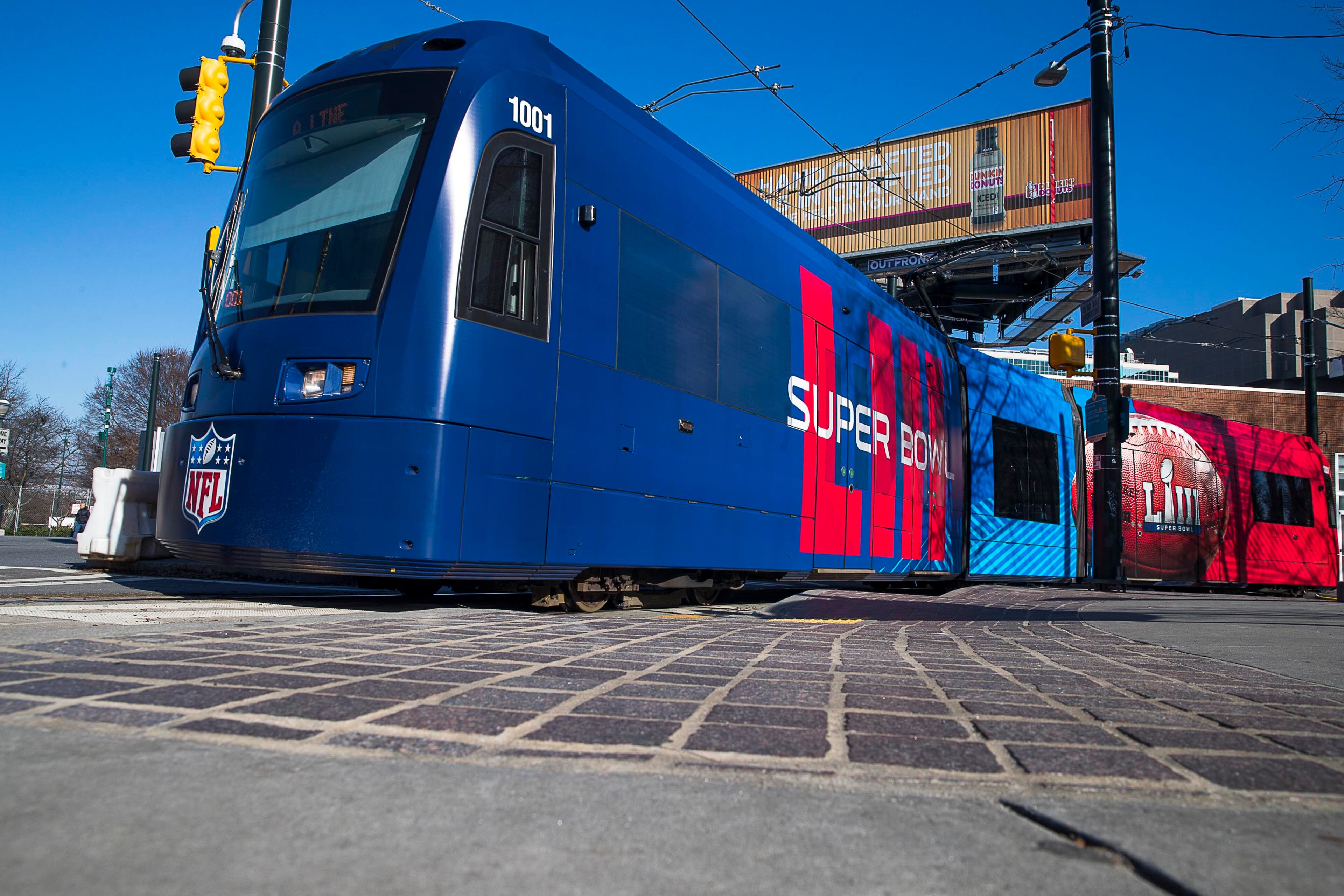 01/16/2019 -- Atlanta, Georgia -- The Atlanta Street Car displays a Super Bowl LIII advertisement as it moves along Centennial Olympic Drive NW in Atlanta, Wednesday, January 16, 2019. (ALYSSA POINTER/ALYSSA.POINTER@AJC.COM)