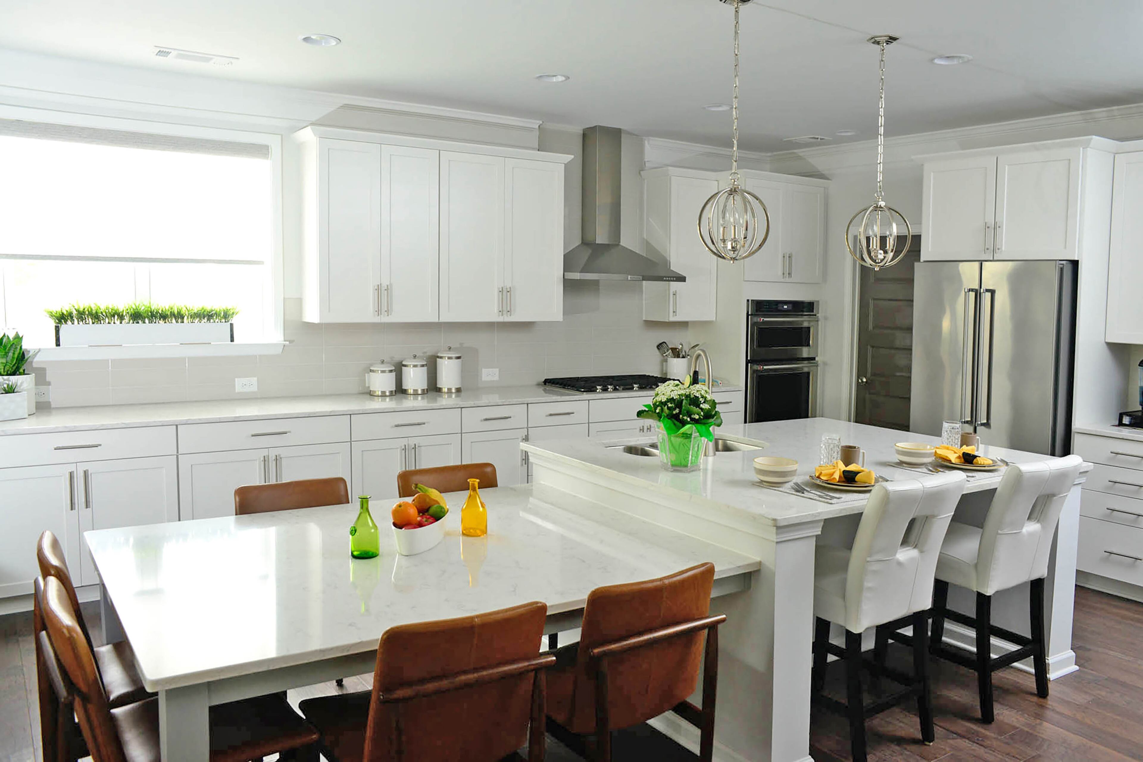 "Both of us love the kitchen because we enjoy cooking together and entertaining with family and friends,"Charyl Ware said. The light, airy kitchen -- complete with KitchenAid appliances and Viatera Minuet quartz countertops installed by builder Ashton Woods -- is a sleek space for the Wares to cook together.