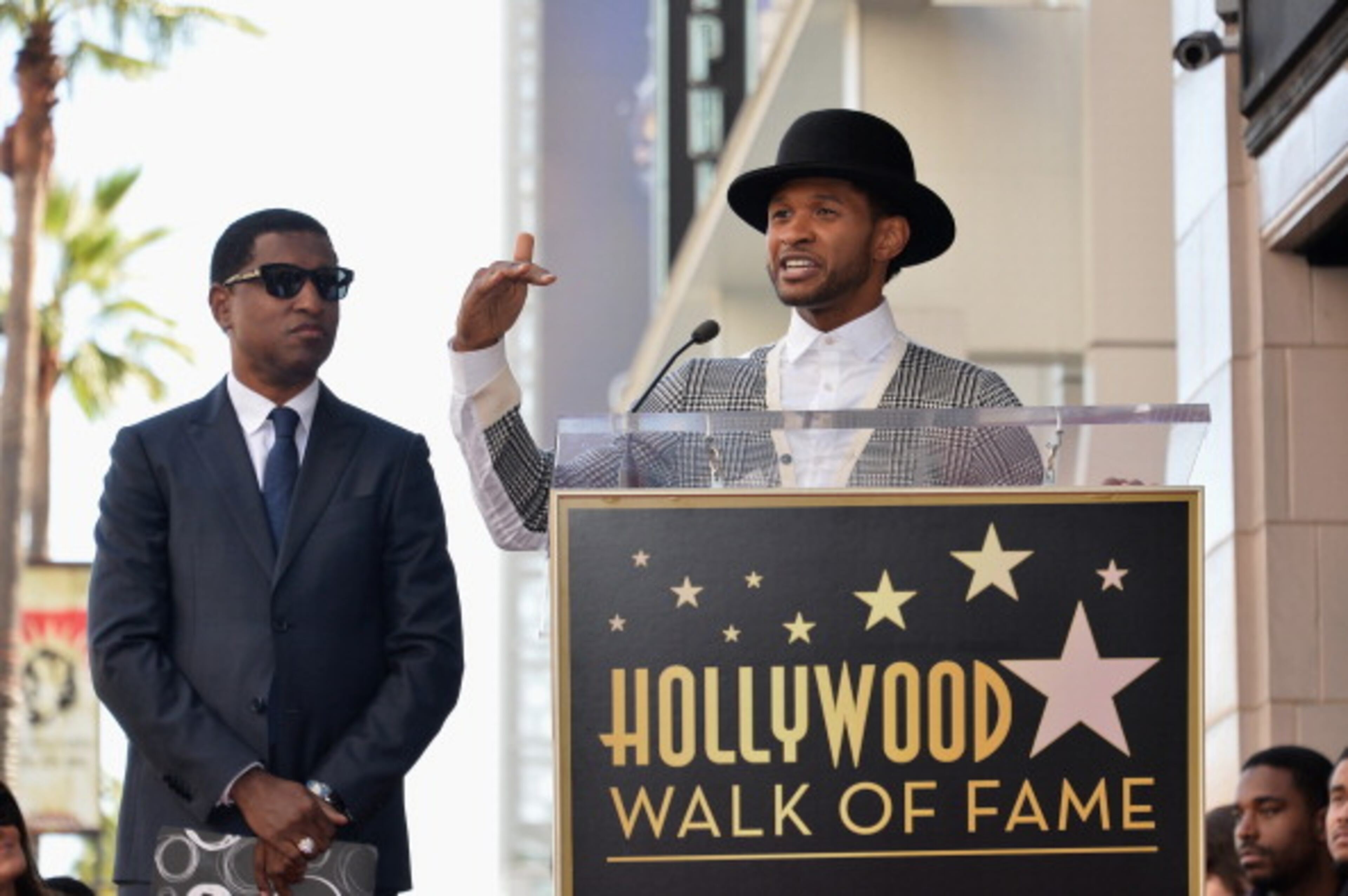 HOLLYWOOD, CA - OCTOBER 10: Songwriter/record producer Kenny "Babyface" Edmonds and singer Usher Raymond attend a ceremony honoring Kenny "Babyface" Edmonds with the 2508th Star on the Hollywood Walk of Fame on October 10, 2013 in Hollywood, California. (Photo by Alberto E. Rodriguez/Getty Images)