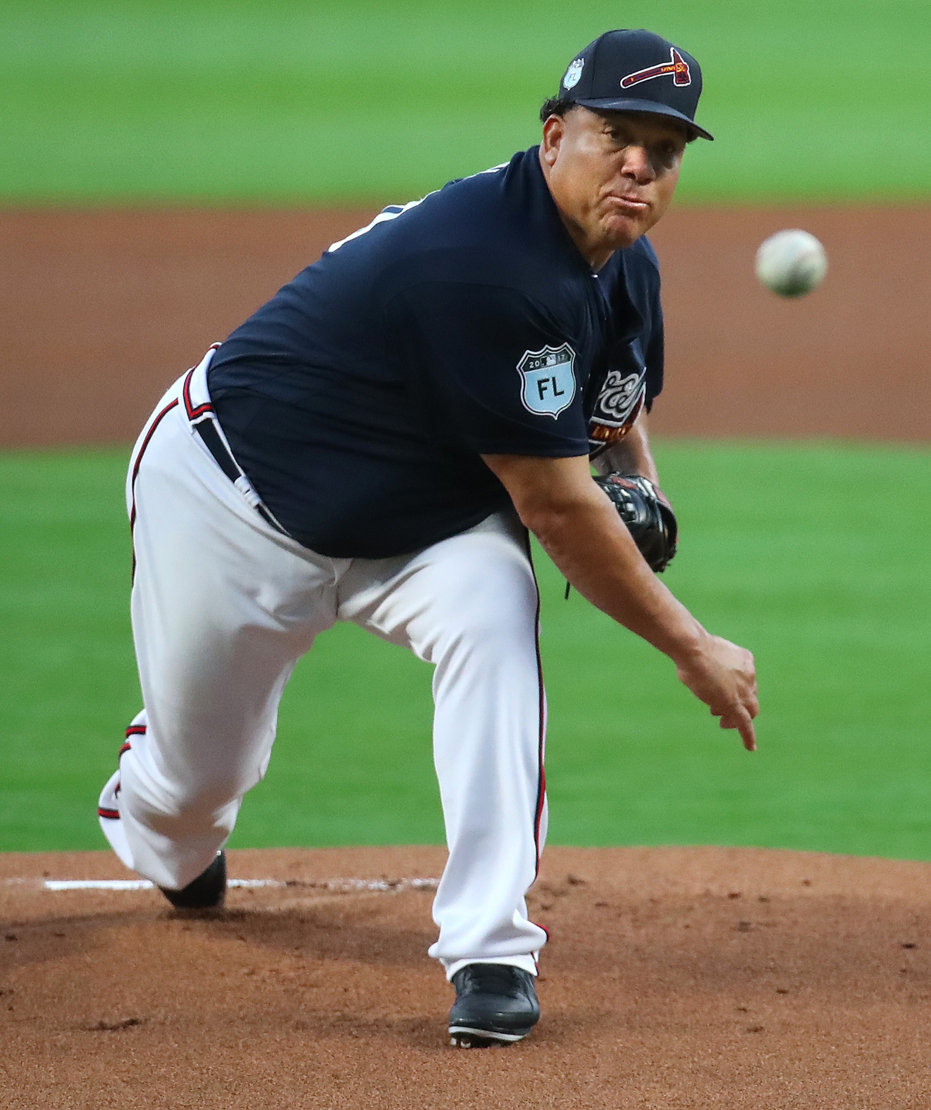 March 31, 2017, Atlanta: Atlanta Braves pitcher Bartolo Colon delivers a pitch against the New York Yankees during the first inning in a MLB exhibition game during the soft opening of SunTrust Park on Friday, March 31, 2017, in Atlanta. Curtis Compton/ccompton@ajc.com