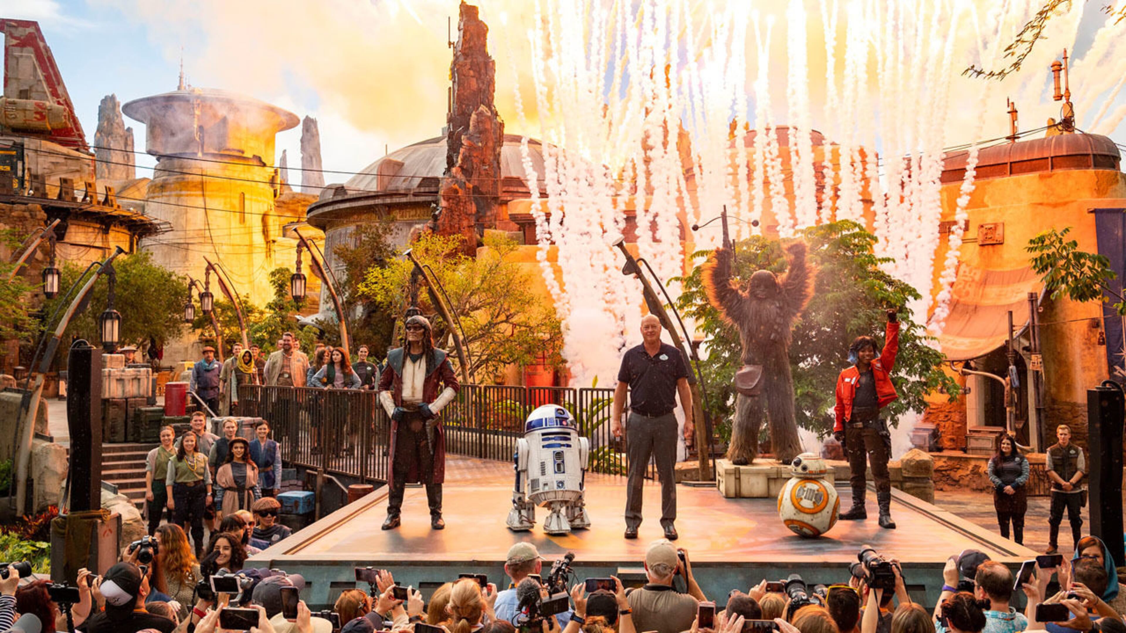 Bob Chapek, chairman of Disney Parks, Experiences and Products, is joined by beloved Star Wars characters during the Aug. 28, 2019, dedication for Star Wars: Galaxy’s Edge at Disney’s Hollywood Studios.