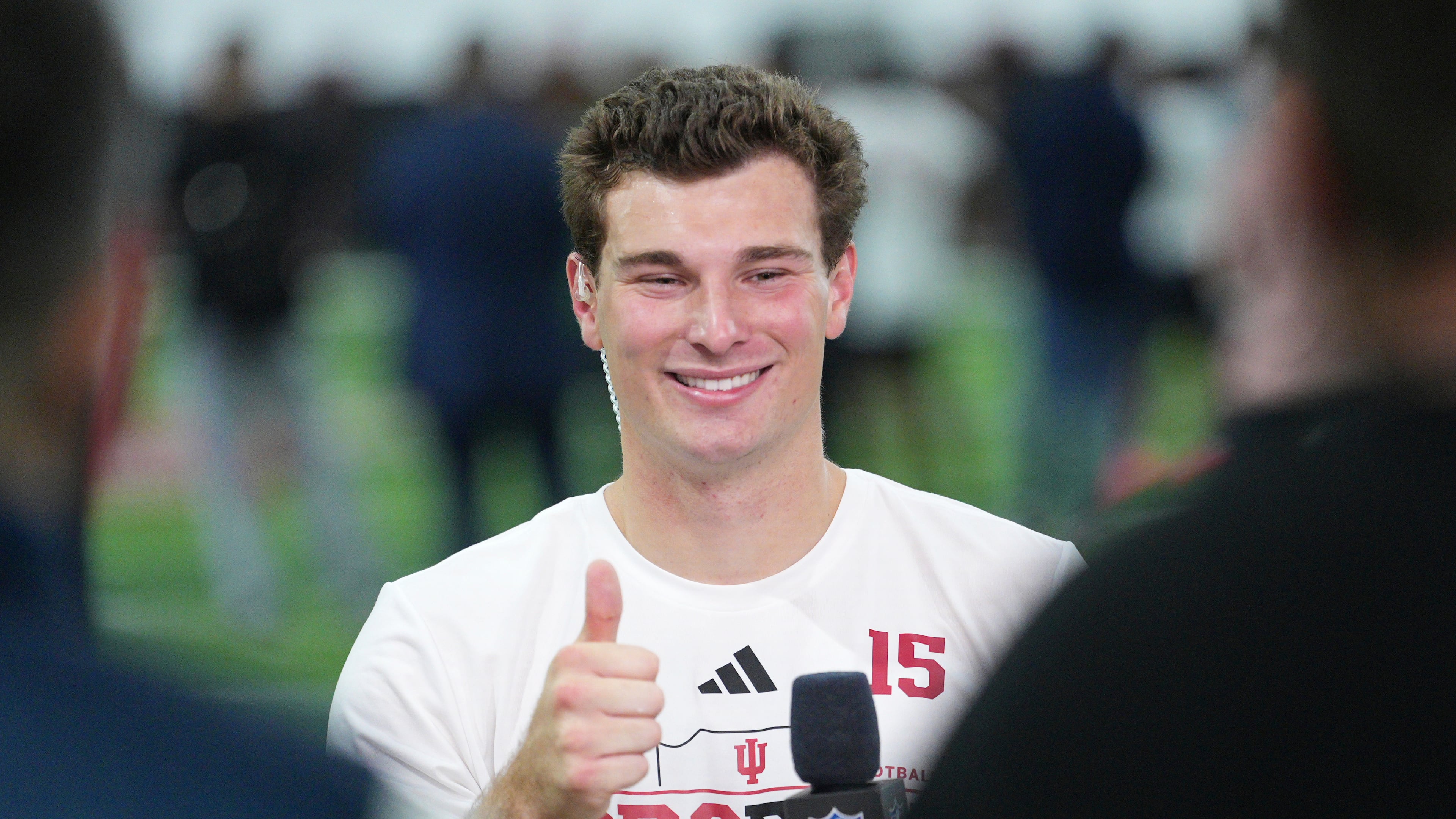 Indiana quarterback Fernando Mendoza gives a thumbs up after an interview with NFL Network at the school's NFL football pro day Wednesday, April 1, 2026, in Bloomington, Ind. (AP Photo/AJ Mast)