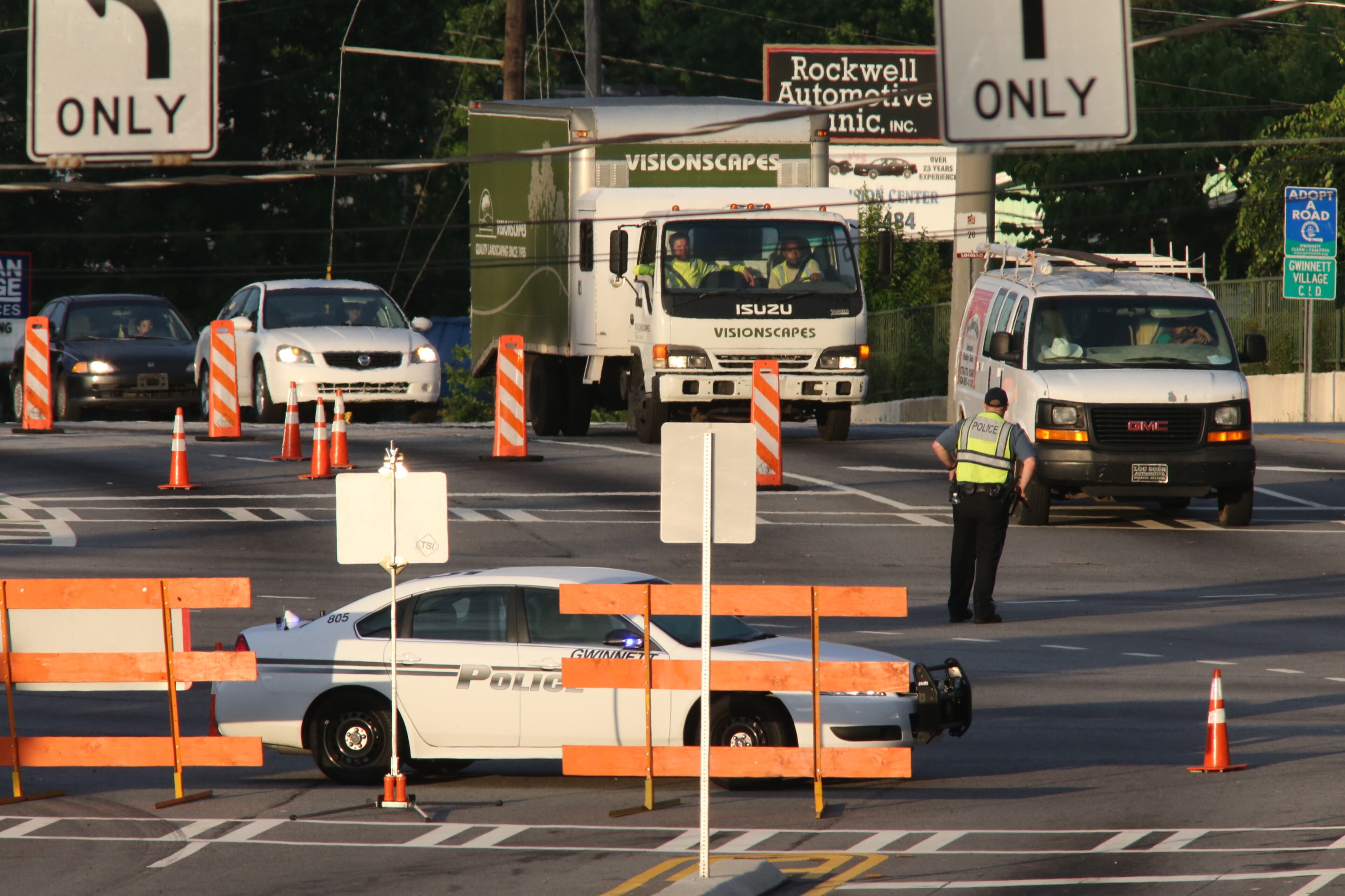 A major Gwinnett County road was blocked this morning after a huge power pole fell across the roadway. The metal utility pole came down onto Singleton Road before 6:30 a.m., blocking all lanes in both directions between Jimmy Carter Boulevard and Thompson Parkway. JOHN SPINK/JSPINK@AJC.COM