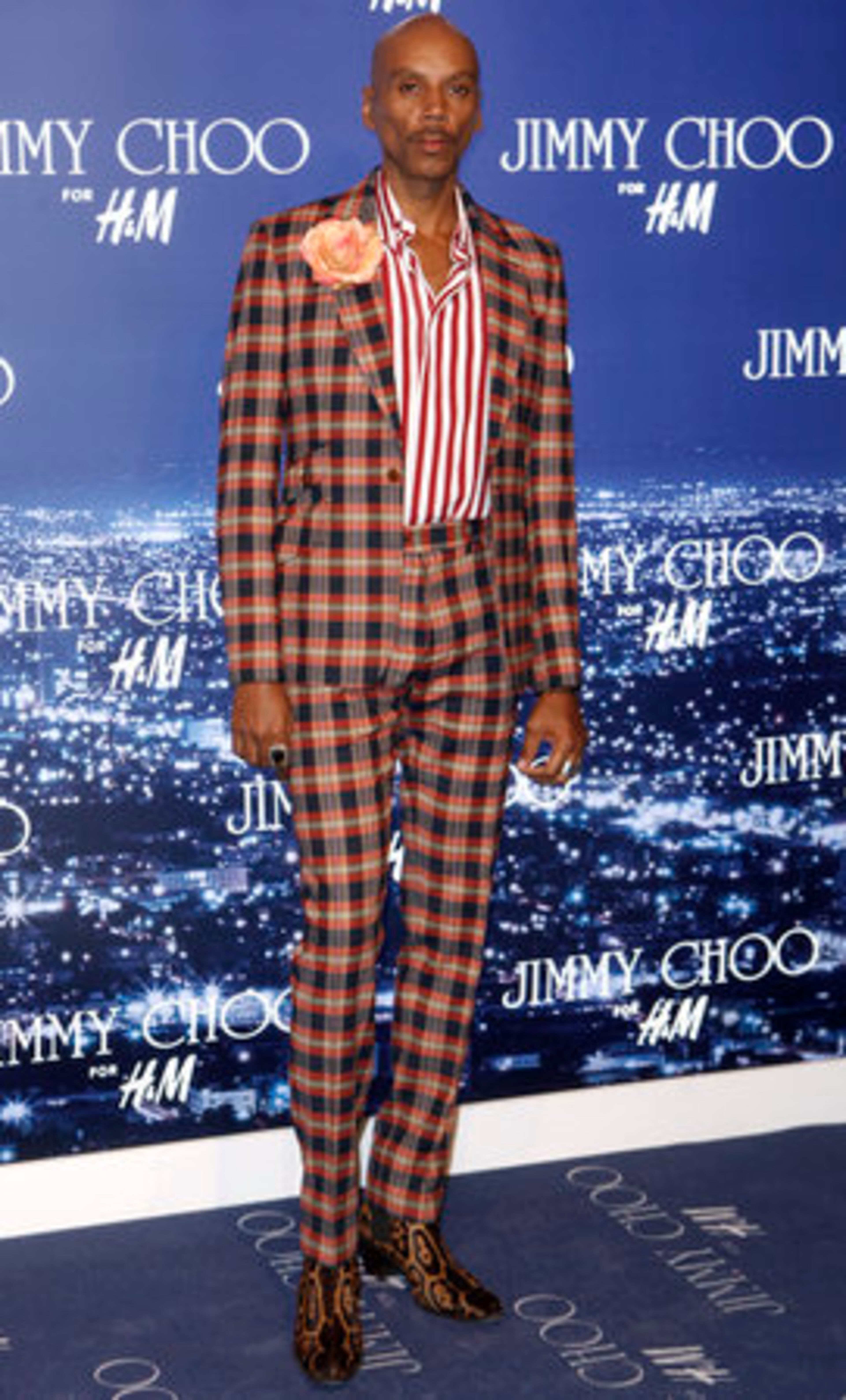 RuPaul arrives at the launch event. The collaboration includes a men's collection of shoes, bags and accessories.