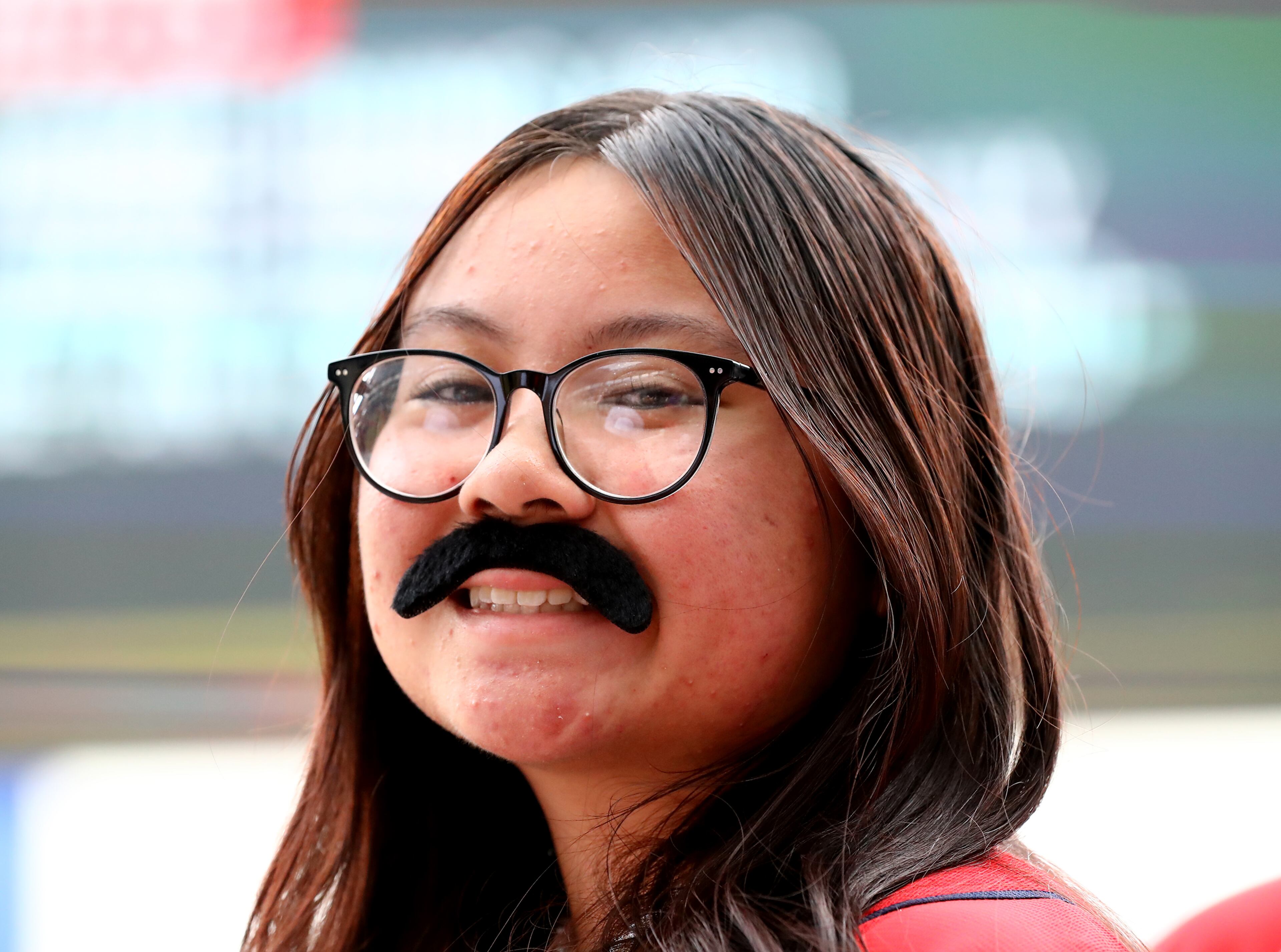 Braves fan Christina Doan, Buford, sports a mustache to show her support for starting pitcher Spencer Strider in game two of the series against the New York Mets in a MLB baseball game on Tuesday, July 12, 2022, in Atlanta. “Curtis Compton / Curtis Compton@ajc.com”