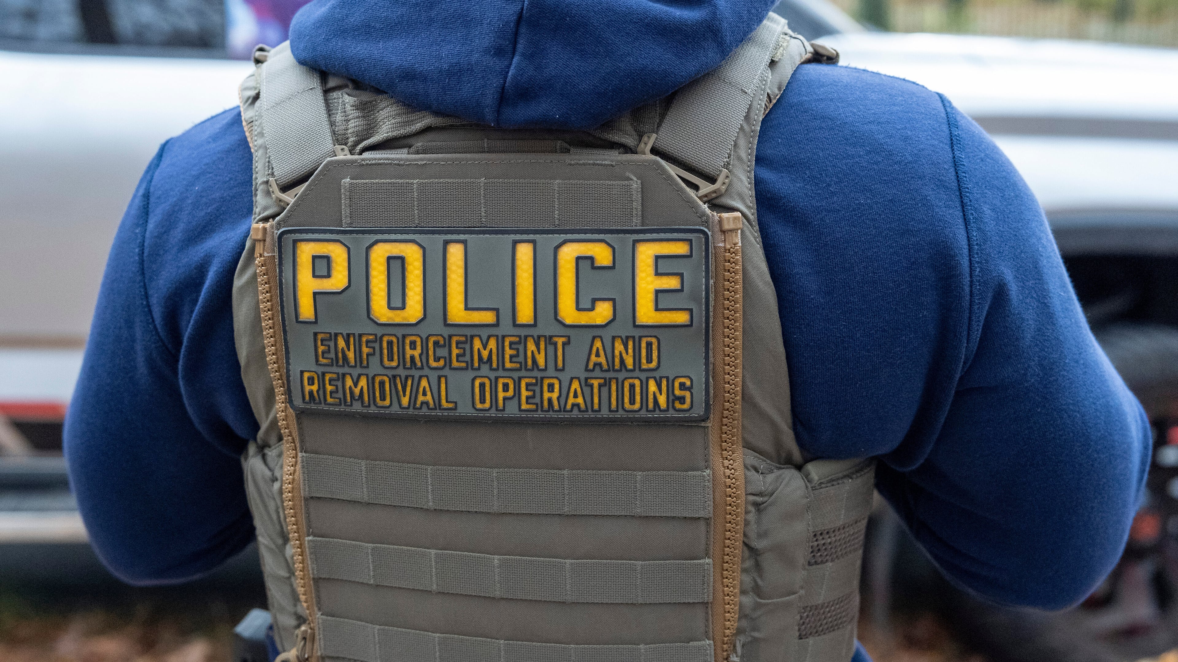 FILE - Federal law enforcement officers with Immigration and Customs Enforcement (ICE) and Enforcement and Removal Operations (ERO) conduct a traffic stop and detain people, Nov. 17, 2025, in Washington. (AP Photo/Alex Brandon, File)