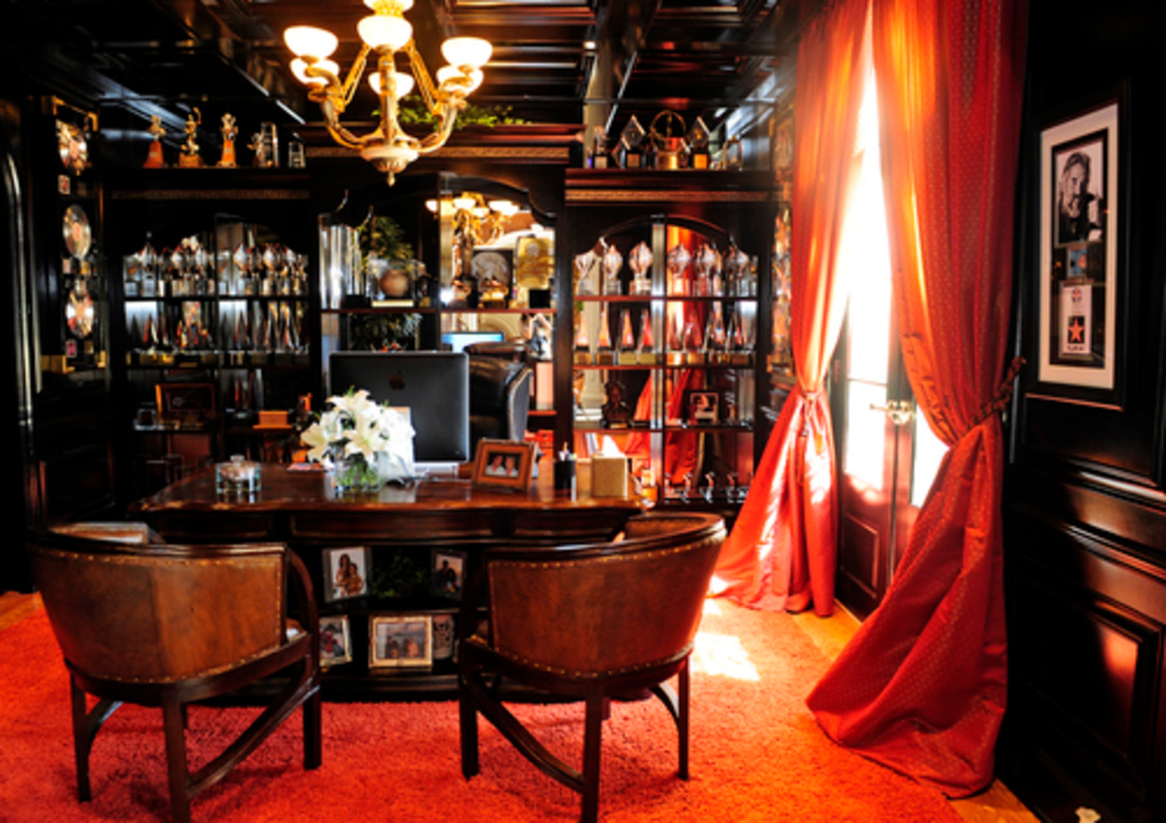 Kenny Rogers coordinates his many creative and business interests from this office just to the right of the home's entrance. The office is a showcase for his many Grammys, gold and platinum records and other awards and honors. Currently, Rogers is coordinating the construction of a new home for his family in Nicholson, Ga., near Athens, planning two upcoming overseas tours and working on several creative projects.