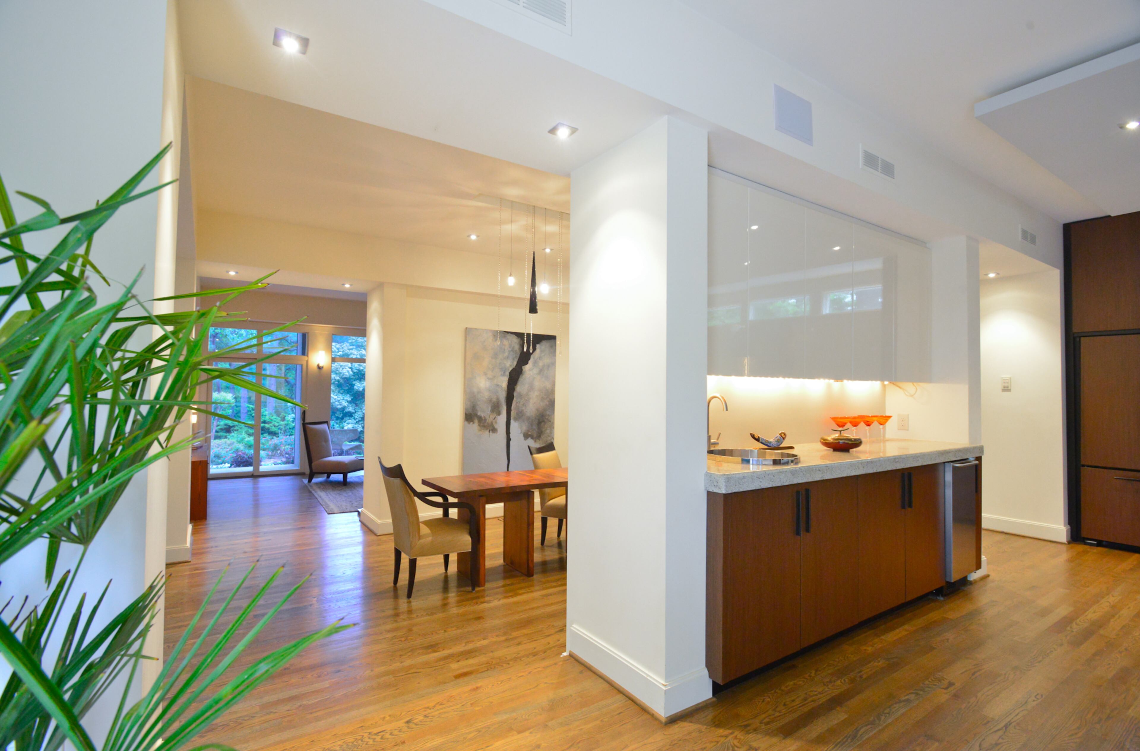 The color palette throughout the home is a blend of many colors, using Sherwin Williams' Panda White as the main color.