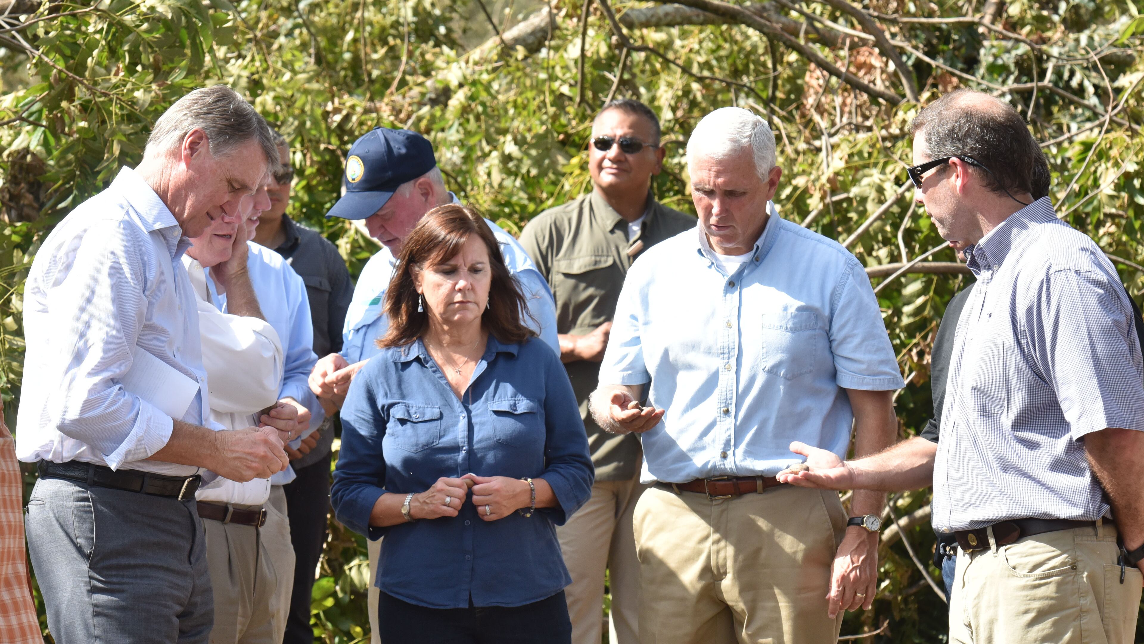 U.S. Sen. David Perdue (L-R), Karen Pence and her husband, Vice President Mike Pence and his wife Karen Pence on a tour to inspect the damage wrought by Hurricane Michael in in October 2018. HYOSUB SHIN / HSHIN@AJC.COM