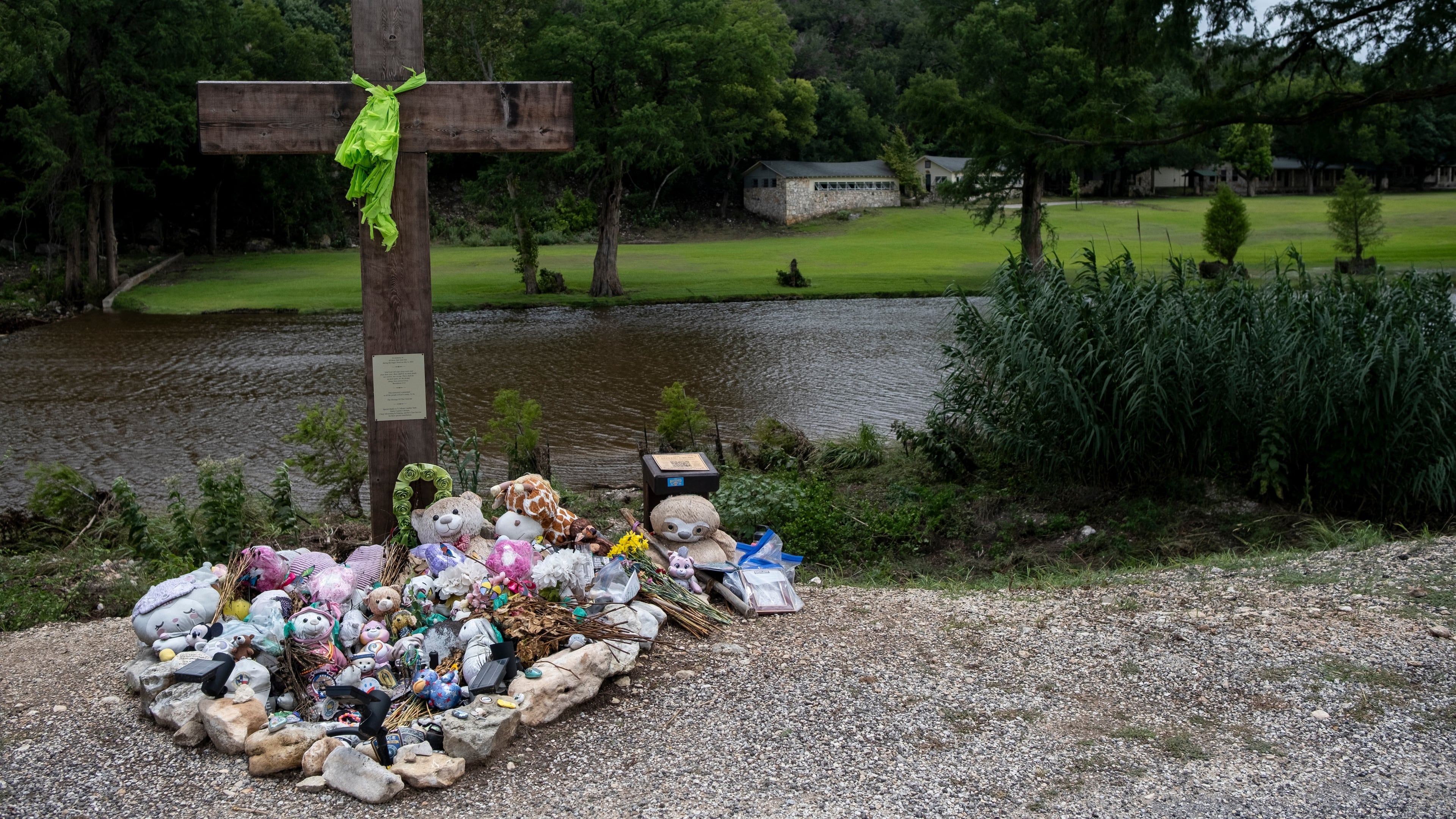 FILE - A memorial for the victims of the 2025 Camp Mystic flood stands, July 17, 2026, in Hunt, Texas. (AP Photo/Joel Angel Juarez, File)
