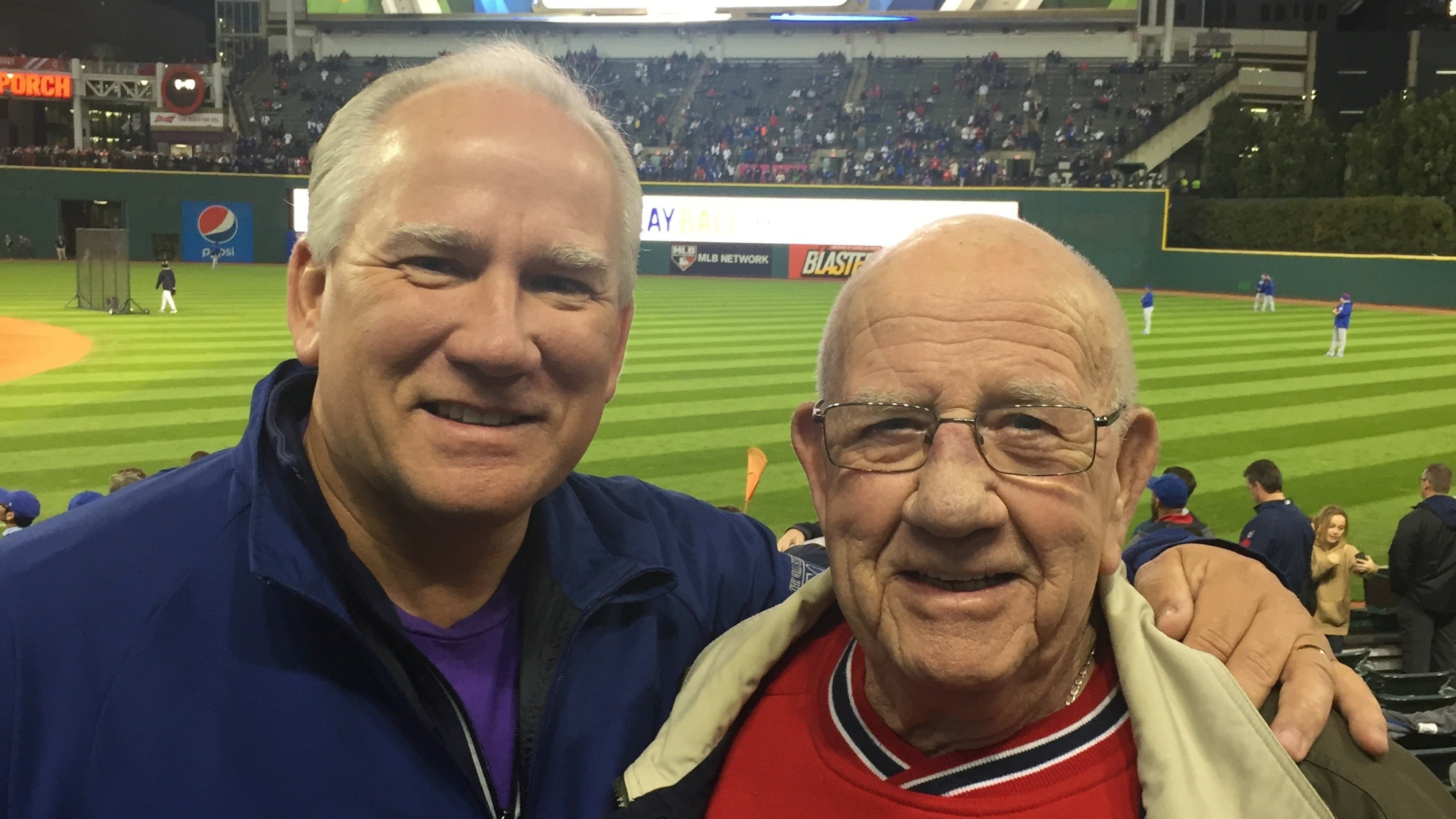 Jim King Jr., left, and his father Jim King Sr. attended Game 1 of the 2016 World Series pitting the Cleveland Guardians (formerly the Indians) against the Chicago Cubs. (Courtesy)