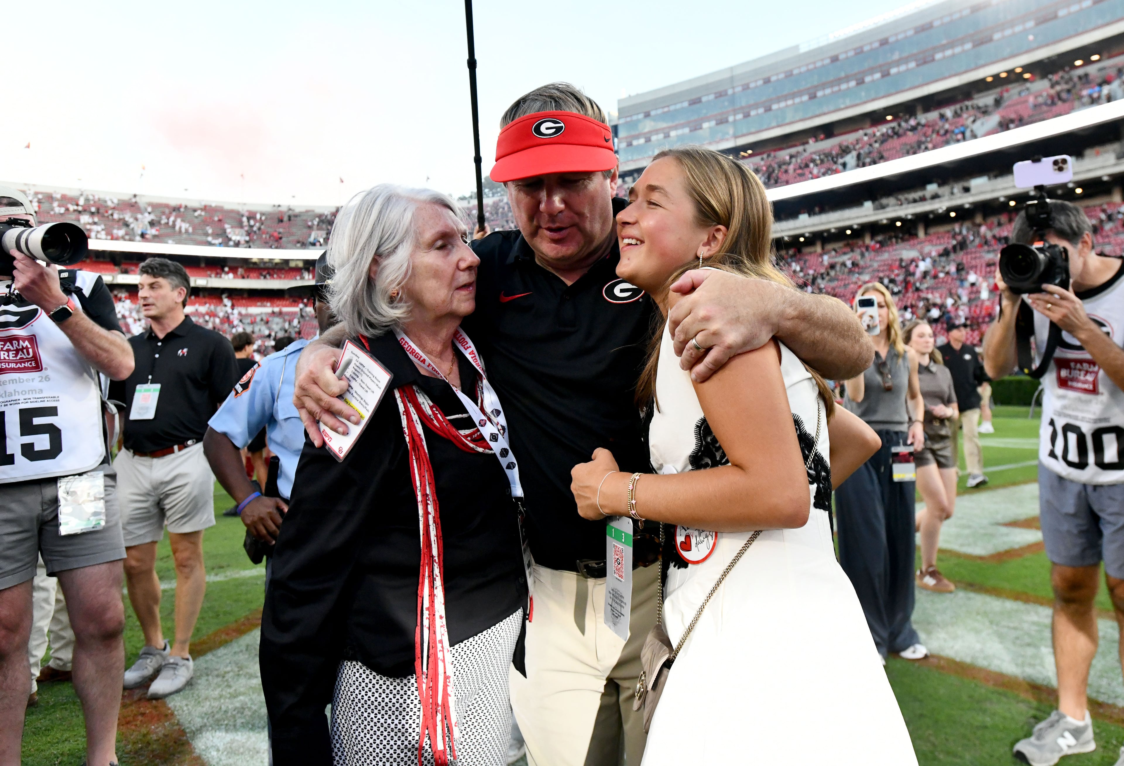 Georgia head coach Kirby Smart celebrates with his mother Sharon and daughter Julia after Georgia defeated Oklahoma 41-13 in an NCAA football game at Sanford Stadium on Saturday, Sept. 26, 2026, in Athens, Ga. (Hyosub Shin/AJC)