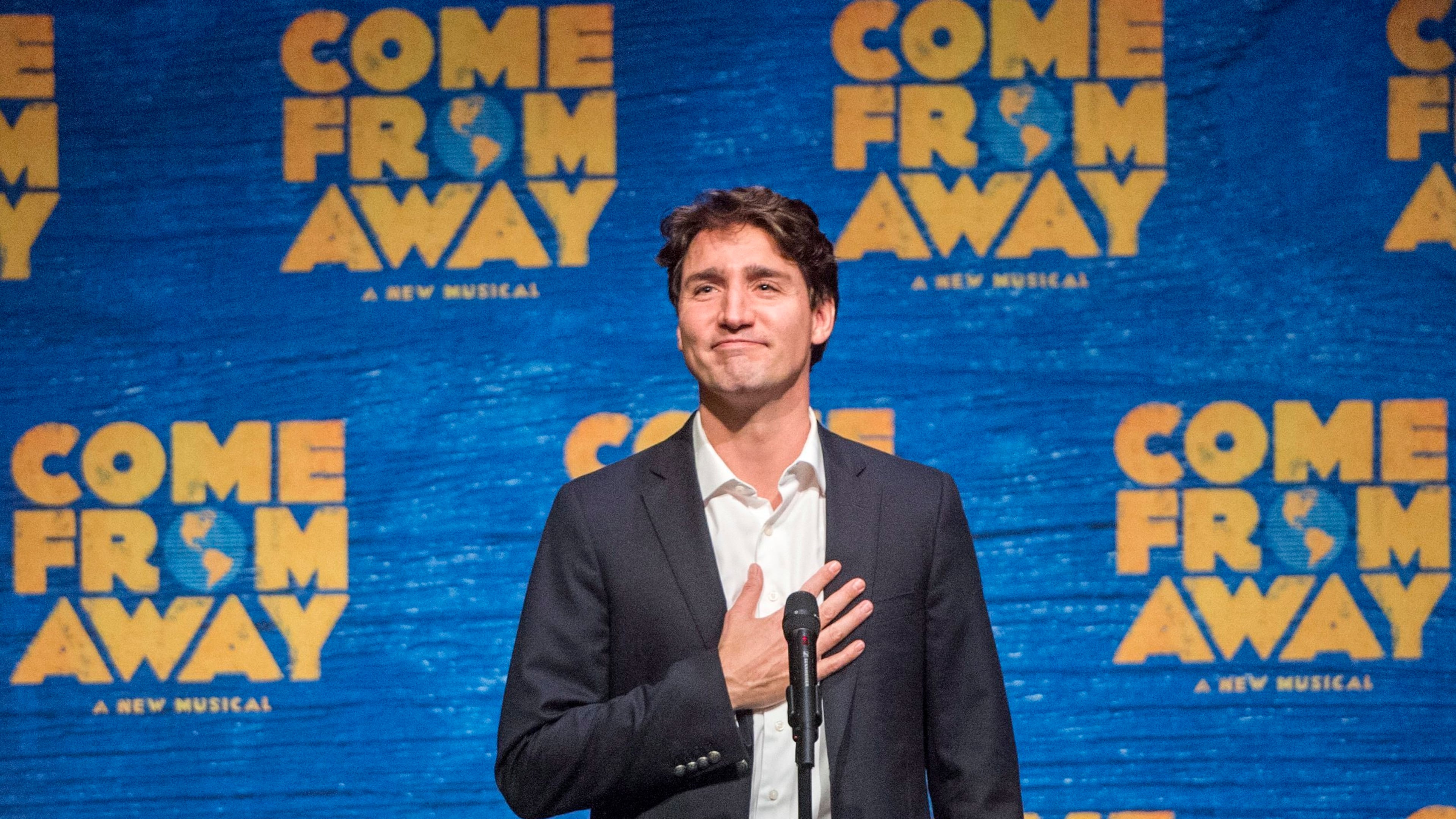 Canadian Prime Minister Justin Trudeau speaks to the audience before the start of the Broadway musical "Come From Away," in New York, on Wednesday, March 15, 2017. (Ryan Remiorz/The Canadian Press via AP)