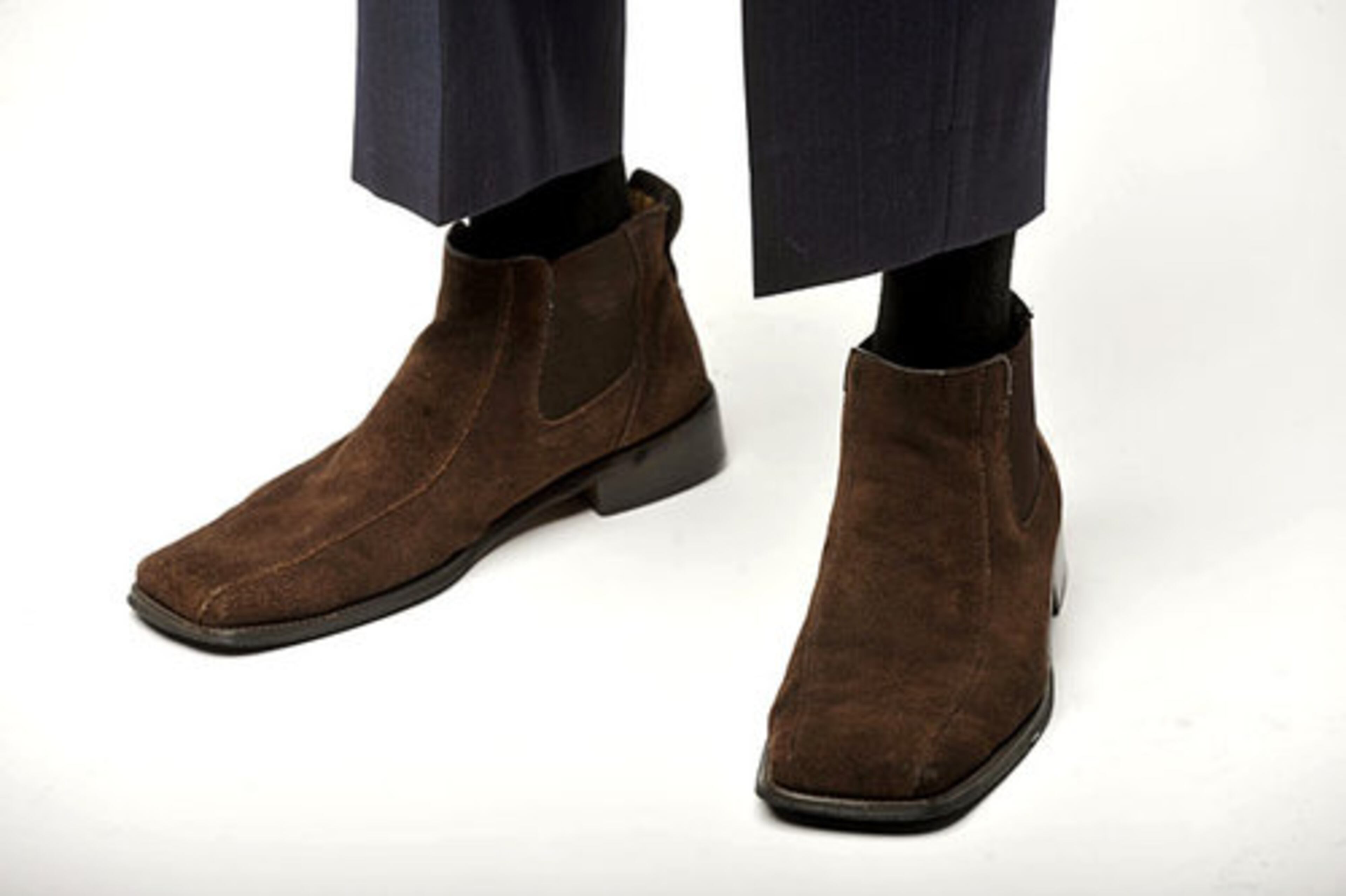 The Problem: Square toe shoes are best left in the 80s, Mukoro says. "For a business suit, you don't wear boots or a square toe shoe. It just looks tacky, " he says.