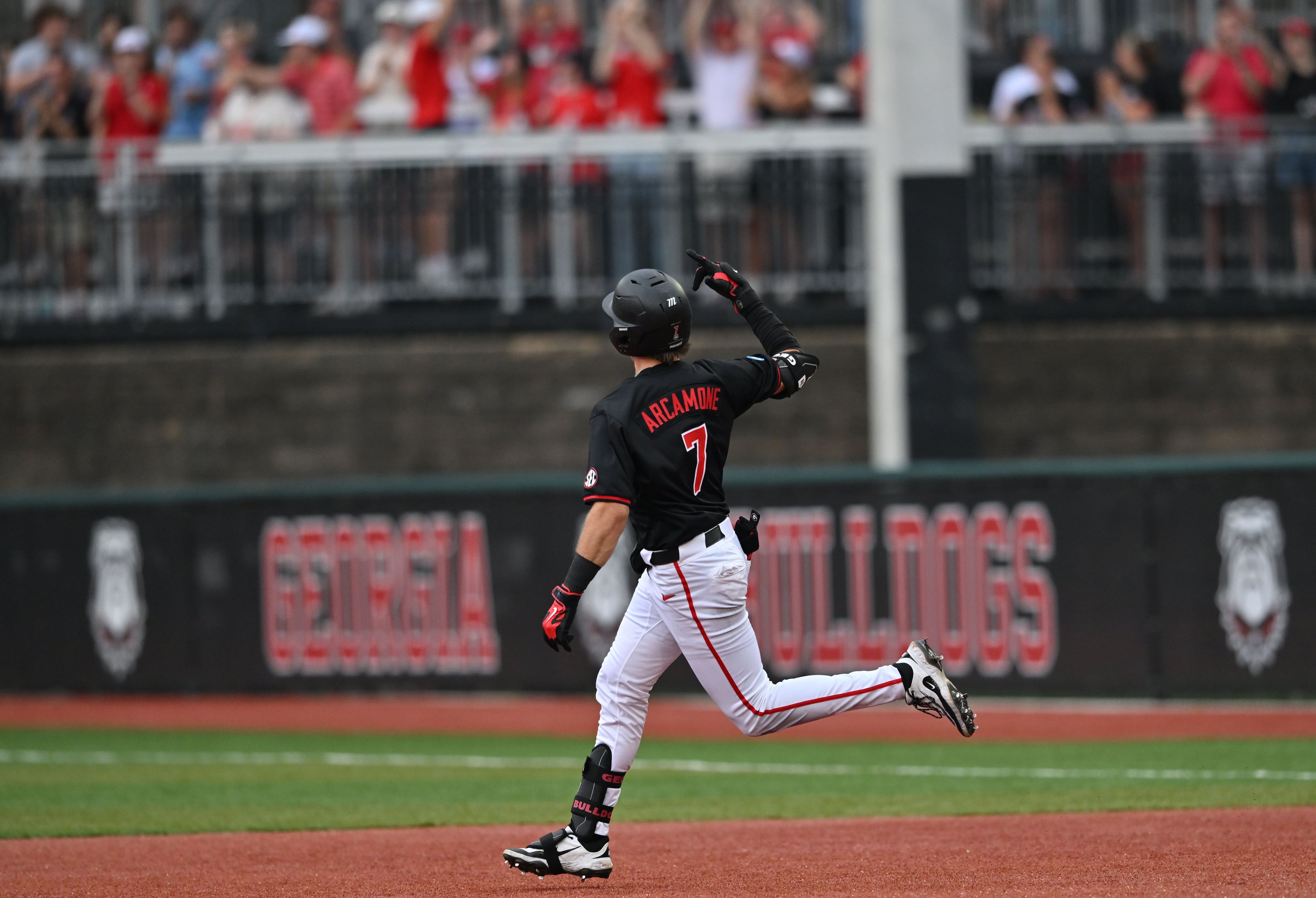 Georgia catcher Jack Arcamone (7) circles the bases on a 2-run home run during the third inning of their NCAA Regional game at Foley Field, Friday, May 29, 2026, in Athens. (Hyosub Shin/AJC)