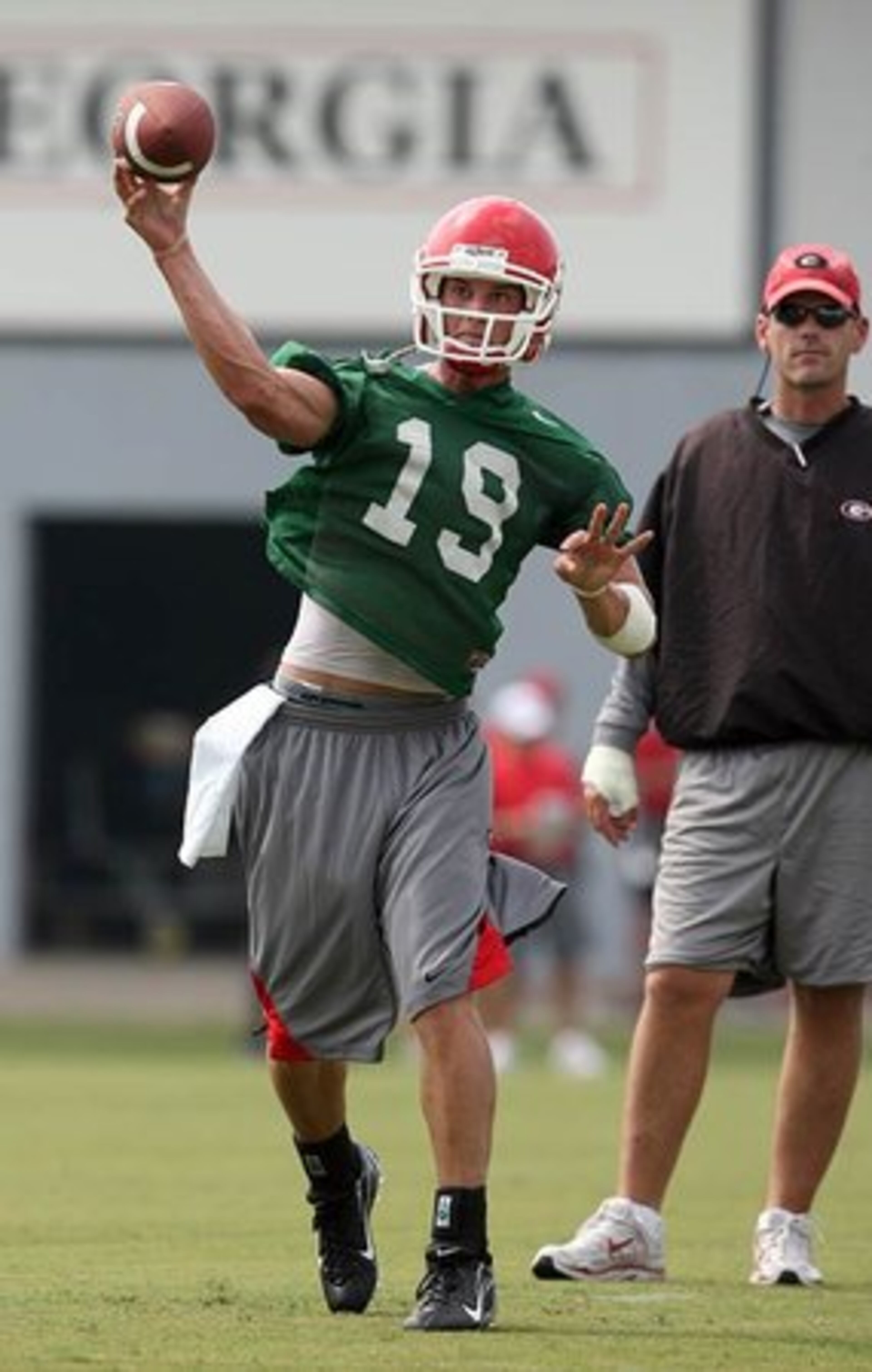 In a February 2010 interview with the AJC's Tim Tucker, Gray (shown here with offensive coordinator Mike Bobo, right, in August 2007 wearing No. 19) said "I'm planning on playing quarterback. If it doesn't work, I'm not opposed to playing receiver or trying to play defense or whatever it may be." When Tucker asked Gray, "Just to be clear, you expect to play quarterback exclusively this spring?," Gray answered, "Yes. Yes."