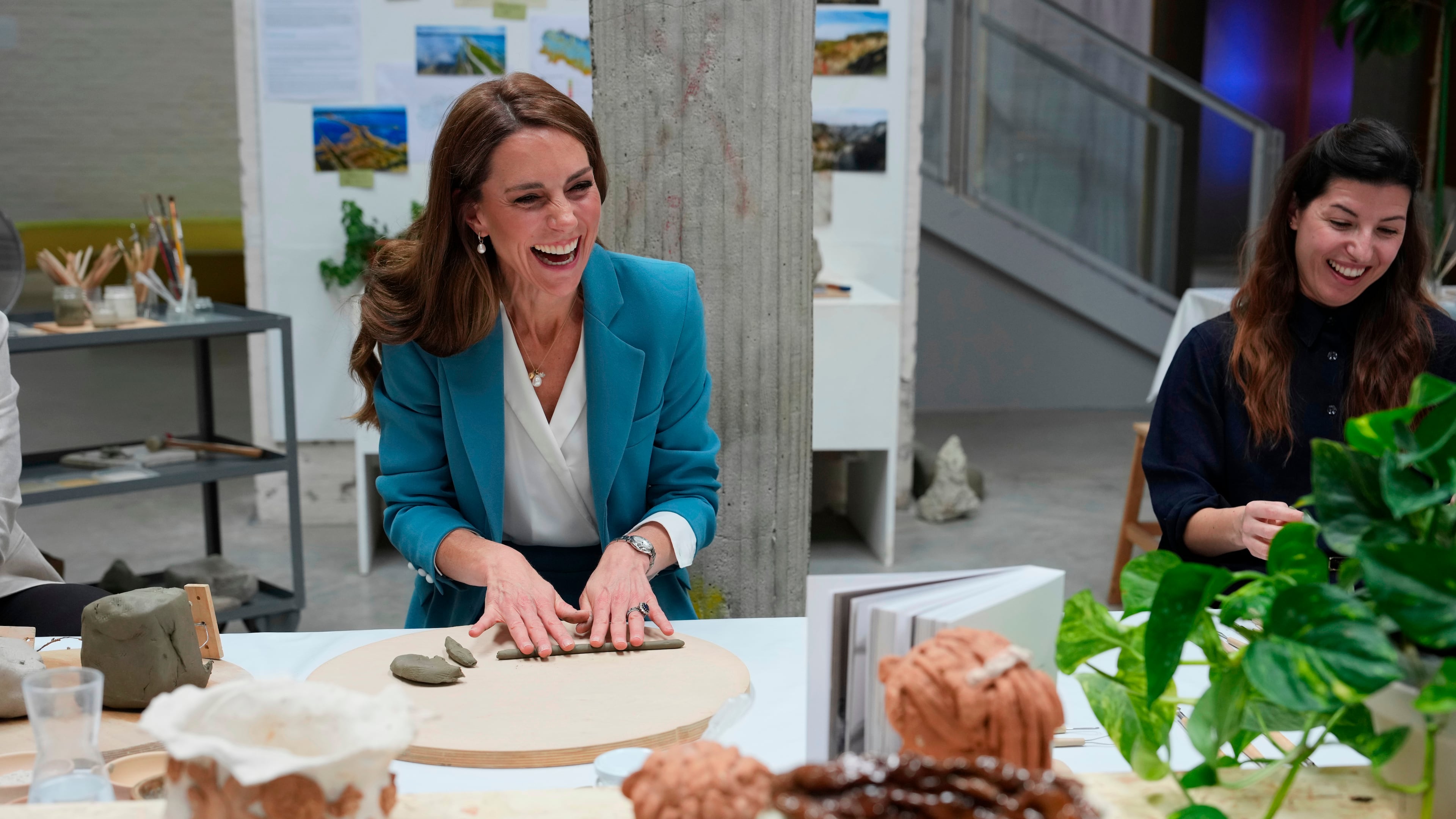 Britain's Kate, Princess of Wales, takes part in an immersive clay atelier workshop at the Loris Malaguzzi International Centre, part of a two-day trip, in Reggio Emilia, Italy, Wednesday, May 13, 2026. (AP Photo/Antonio Calanni, Pool)