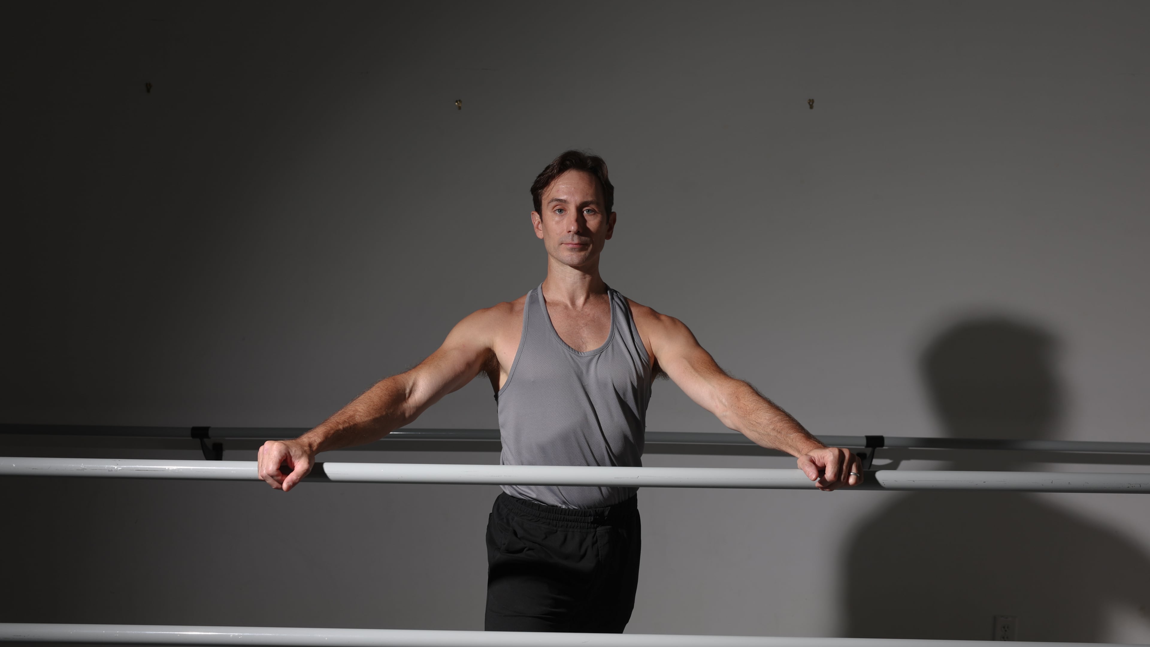 Dancer Christian Clark, shown at Terminus Modern Ballet Theatre's studio in Atlanta, will help open the ballet company's 10th season in its White Box Theatre at Tula Arts Center in Buckhead starting Saturday through Sept. 27. (Arvin Temkar/AJC)