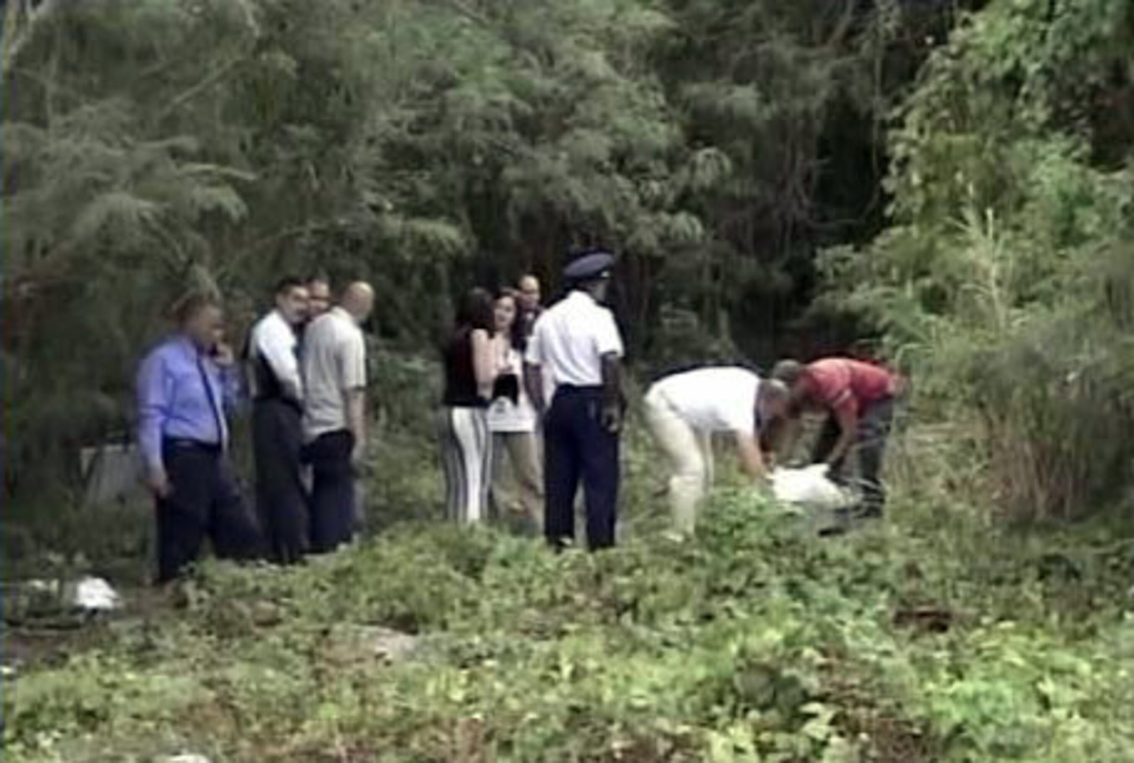 Police said Eliezer Marquez Navedo, 36, apparently acted alone in a random crime. Here, authorities examine the scene.