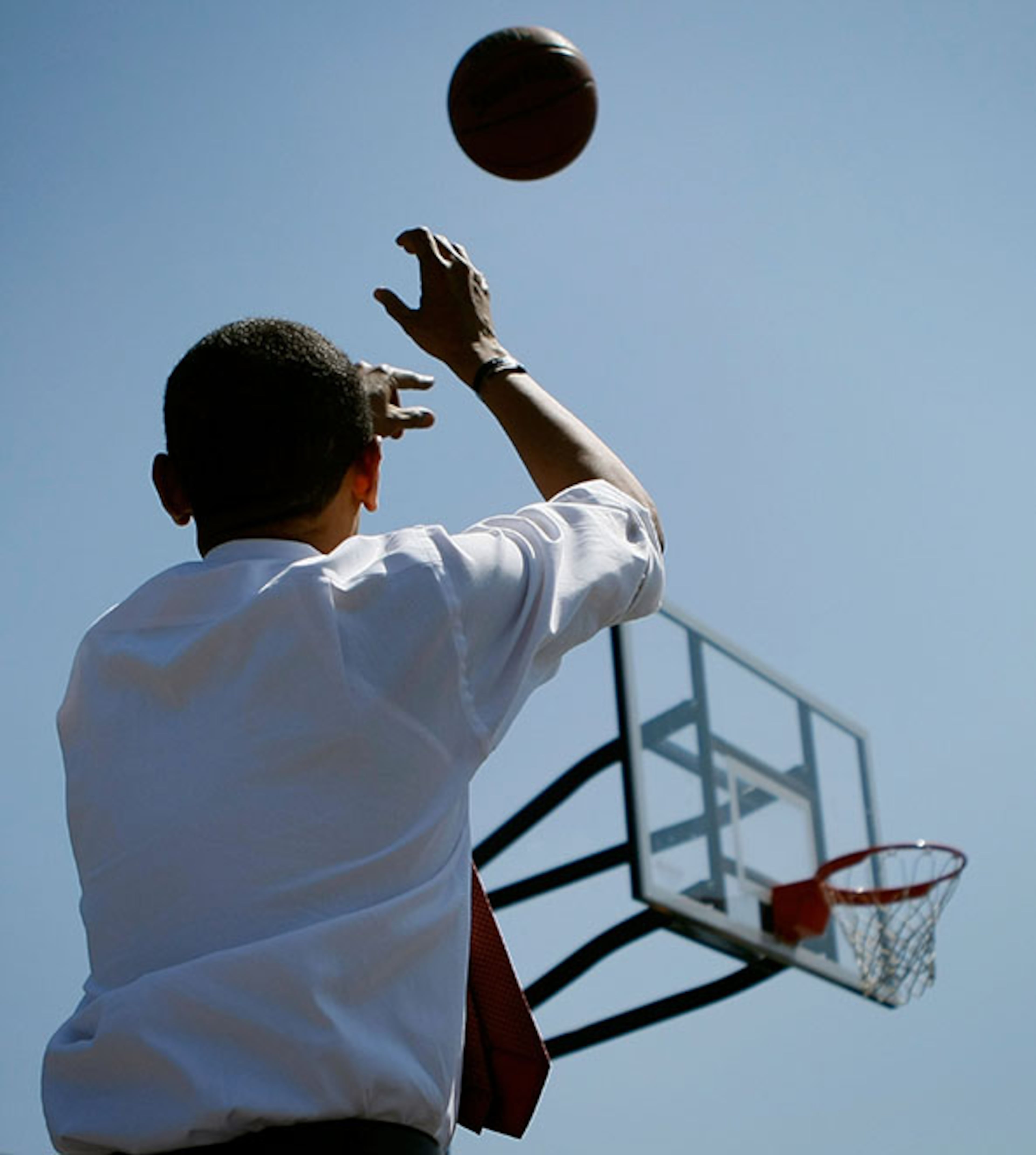 ELKHART, IN- MAY 04: Democratic presidential hopeful Sen. Barack Obama (D-IL) shoots a basketball on the court at Riverview Elementry School, May 4, 2008 in Elkhart, Indiana. Indiana and North Carolina go to the polls May 6. (Photo by Mark Wilson/Getty Images)