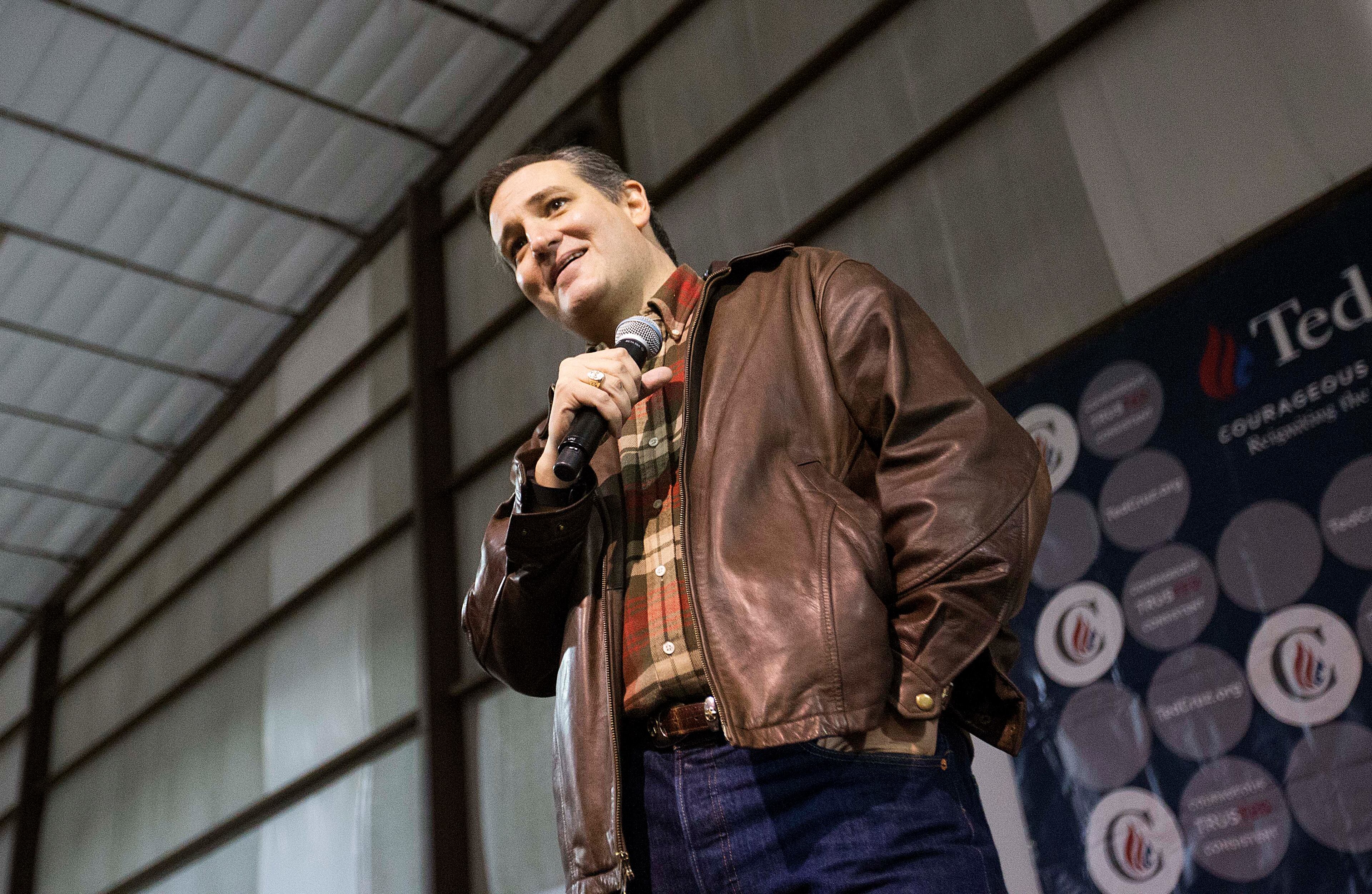 Republican presidential candidate, Sen. Ted Cruz, R-Texas, speaks during a campaign event in an airport hanger Friday, Dec. 18, 2015, in Kennesaw, Ga. (AP Photo/David Goldman)
